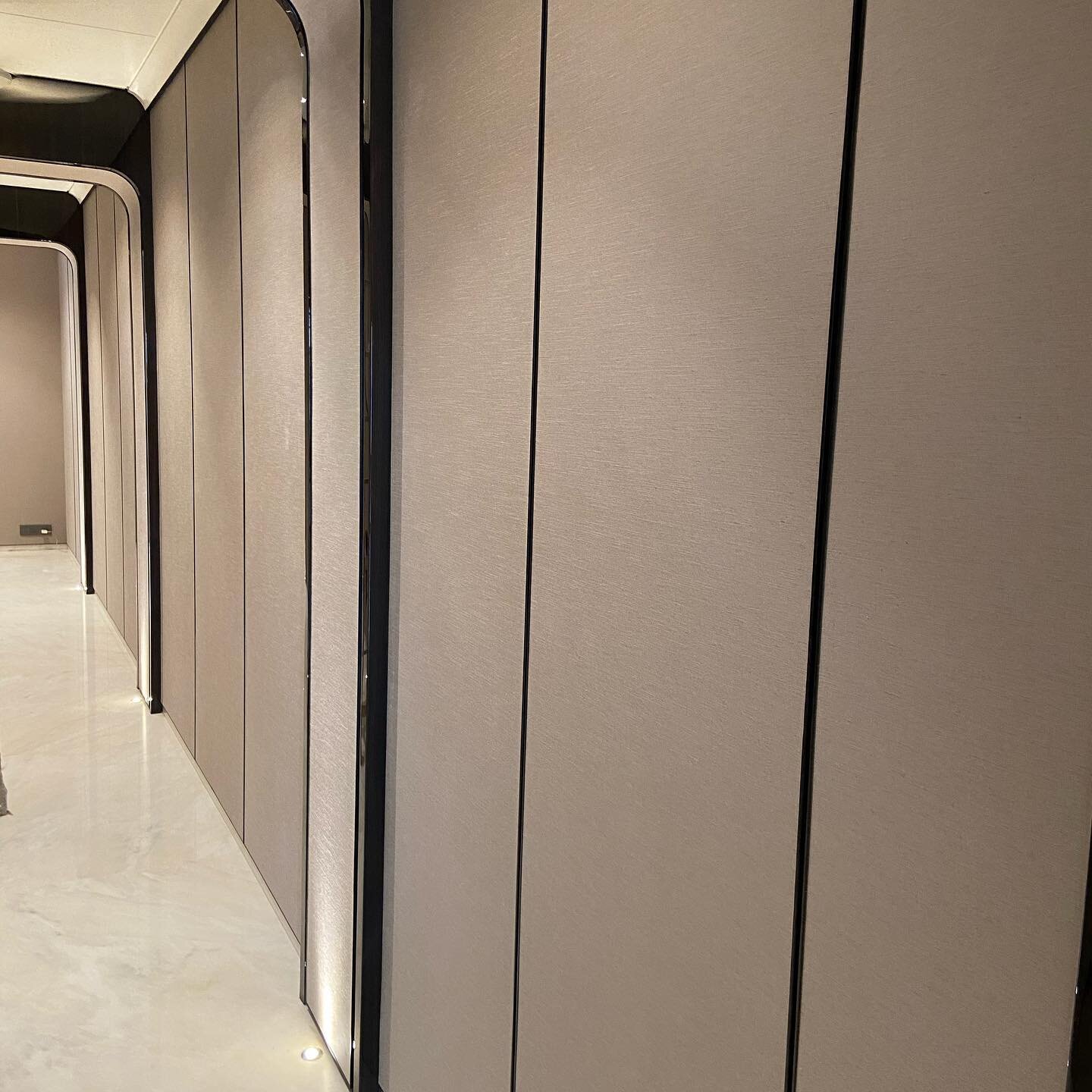 New site handover alert!!! Our Pure silk  wallpaper adorn these passageways ending it with a mural. Apartment in the clouds. Ultra Lux interiors by @interworldfurnishings installation is the key. We have trained professionals who take immense pride i
