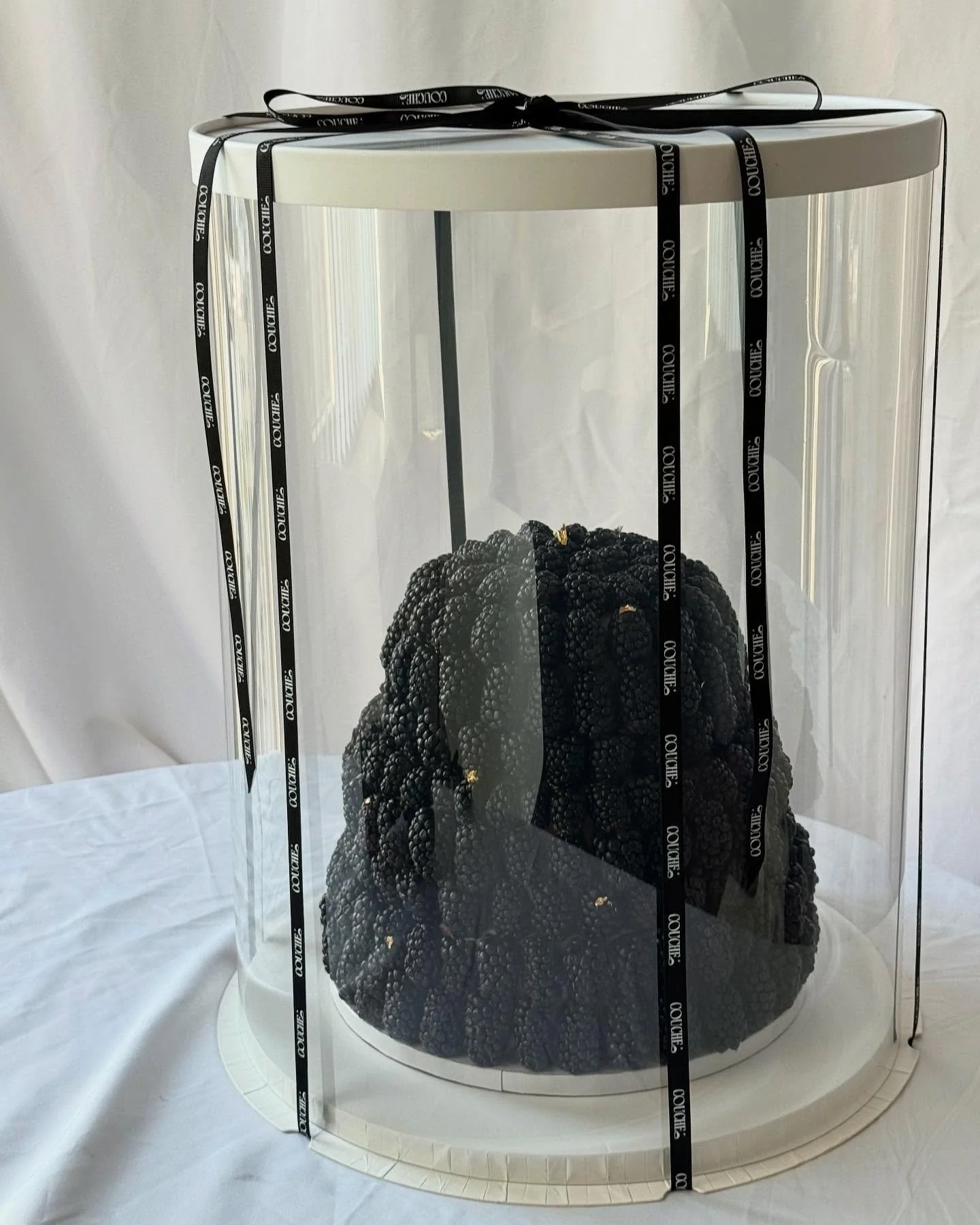 Three-tiered cloche cake with 10000000 blackberries for @nickybradley @maclainmills wedding 🥹