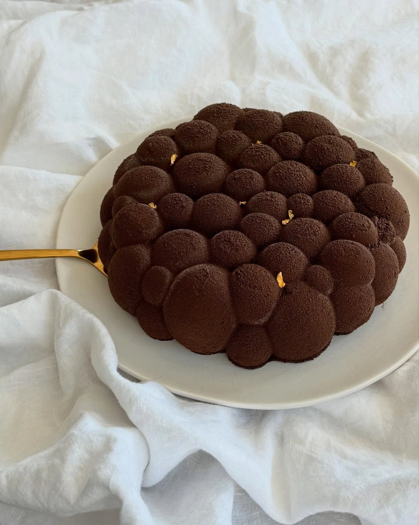 Back from our summer recess with a Cocoa Cloud Cake ☕️