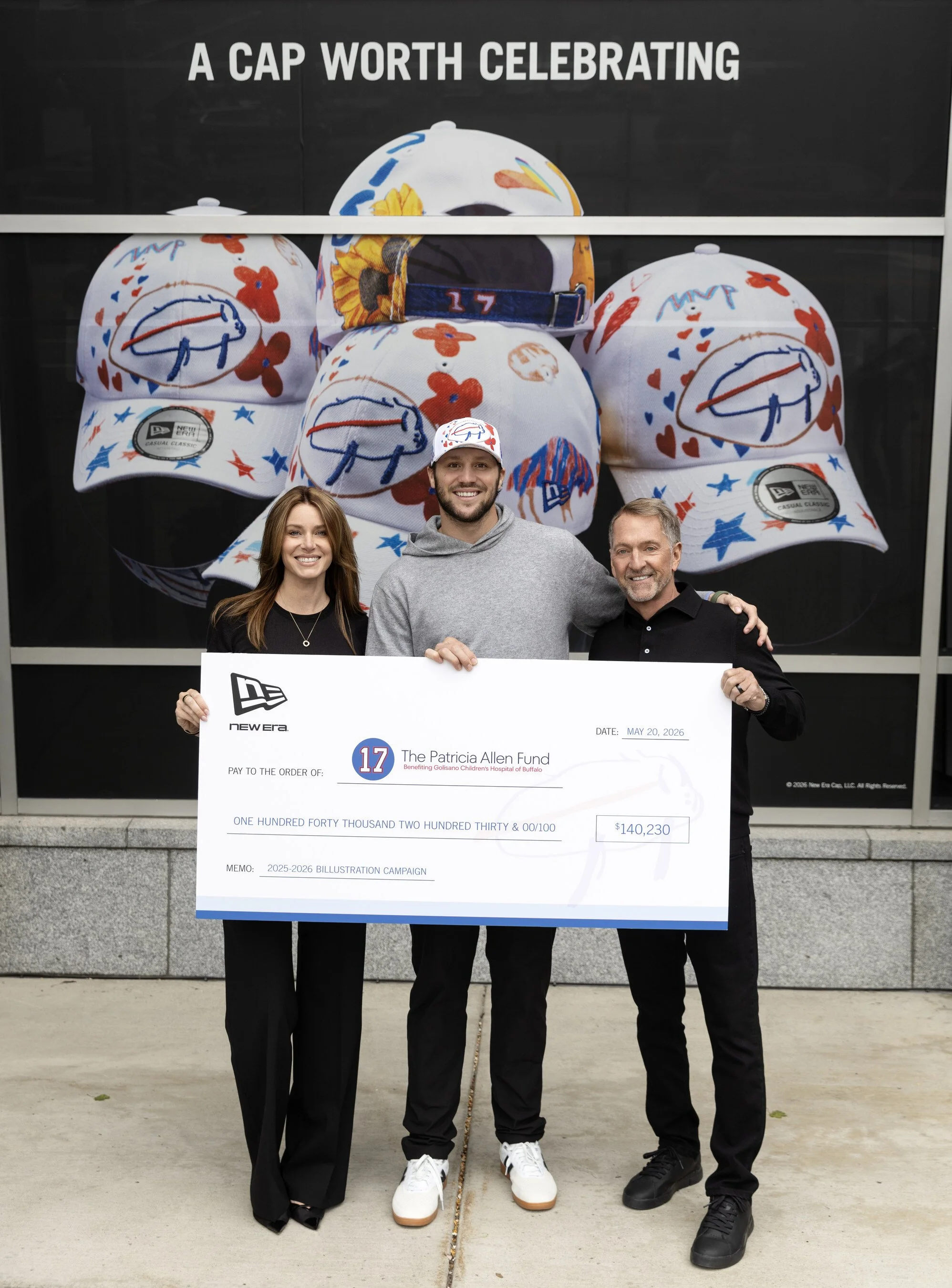  New Era's Danielle and Chris Koch with Josh Allen at New Era Headquarters, presenting a check to the Patricia Allen Fund benefiting Golisano Children’s Hospital of Buffalo in Buffalo, New York • Photo Credit: New Era Cap LLc 