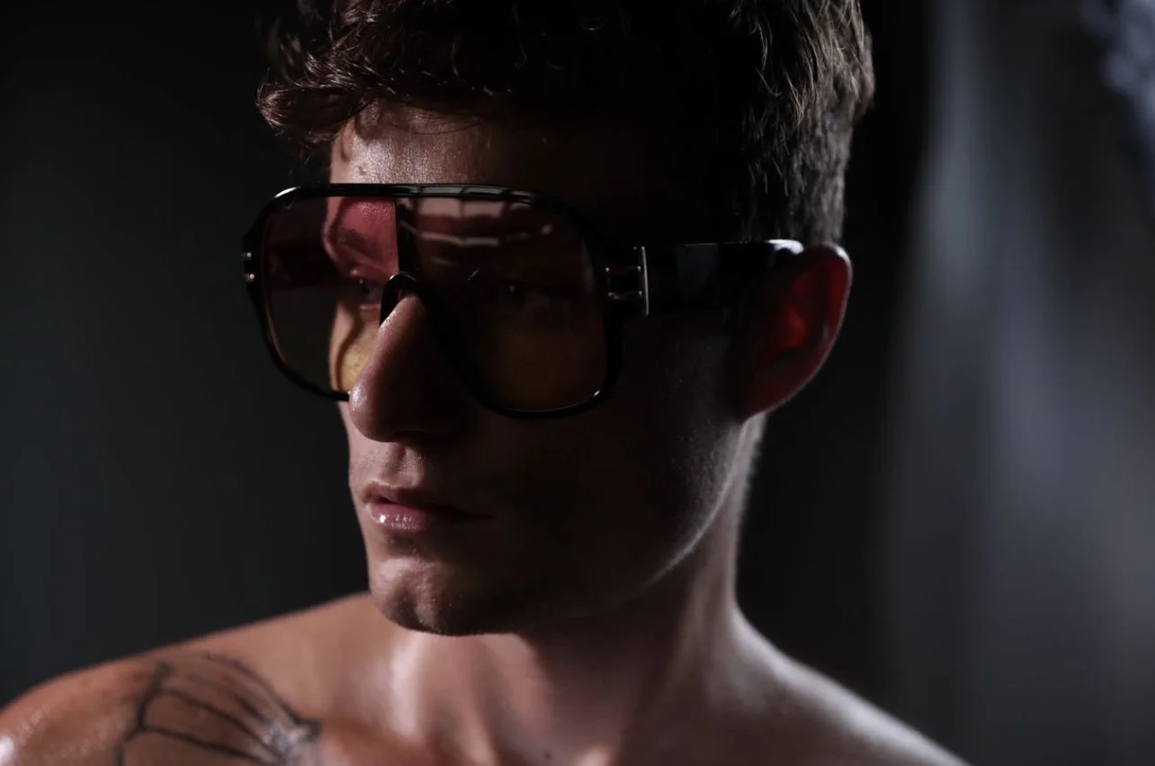 Model Chancellor Fekete wearing '1975' sunglasses by V SHADES with yellow tinted lenses • Photo by Real Photos Florida