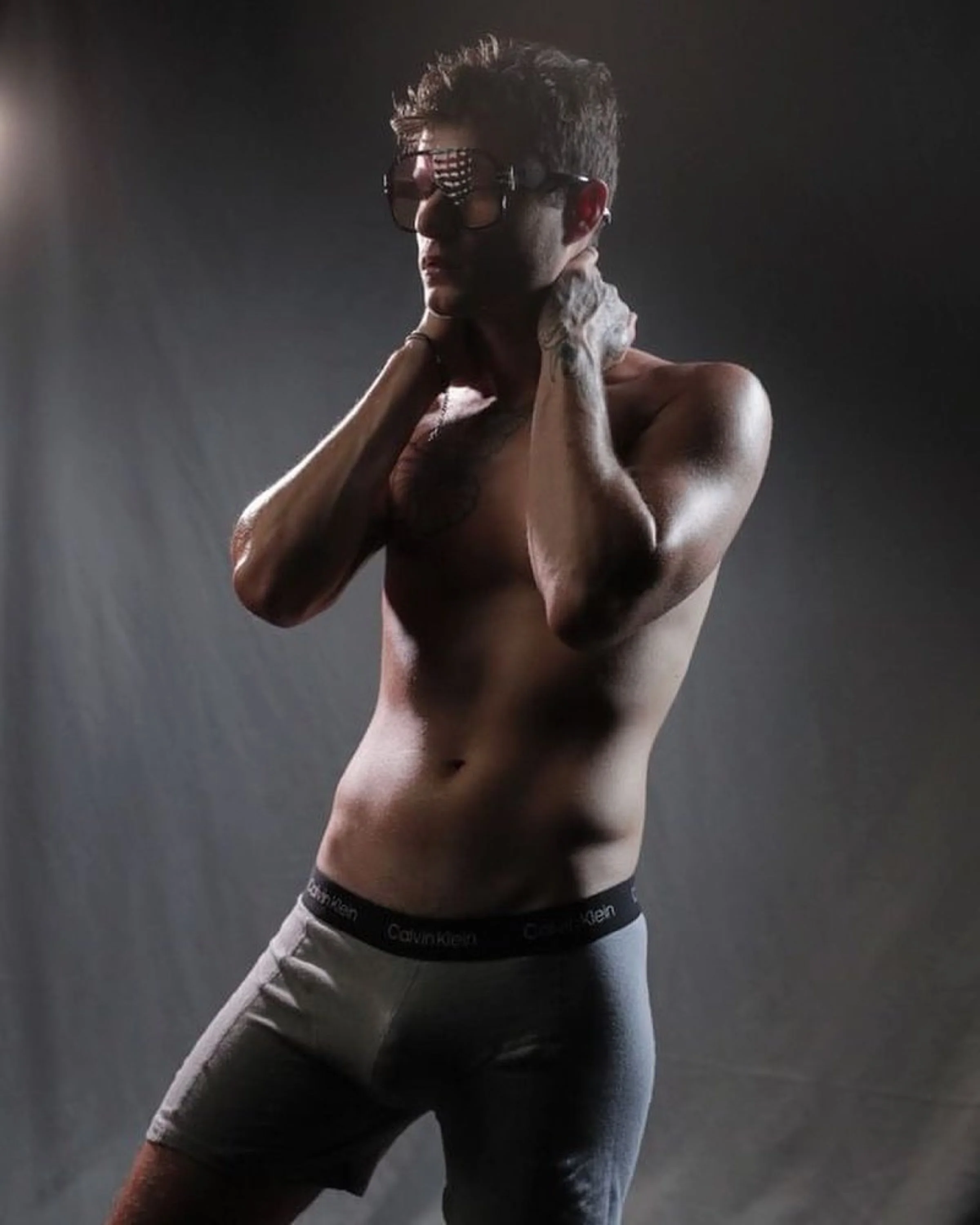 Model Chancellor Fekete wearing '1975' sunglasses by V SHADES with yellow tinted lenses • Photo by Real Photos Florida