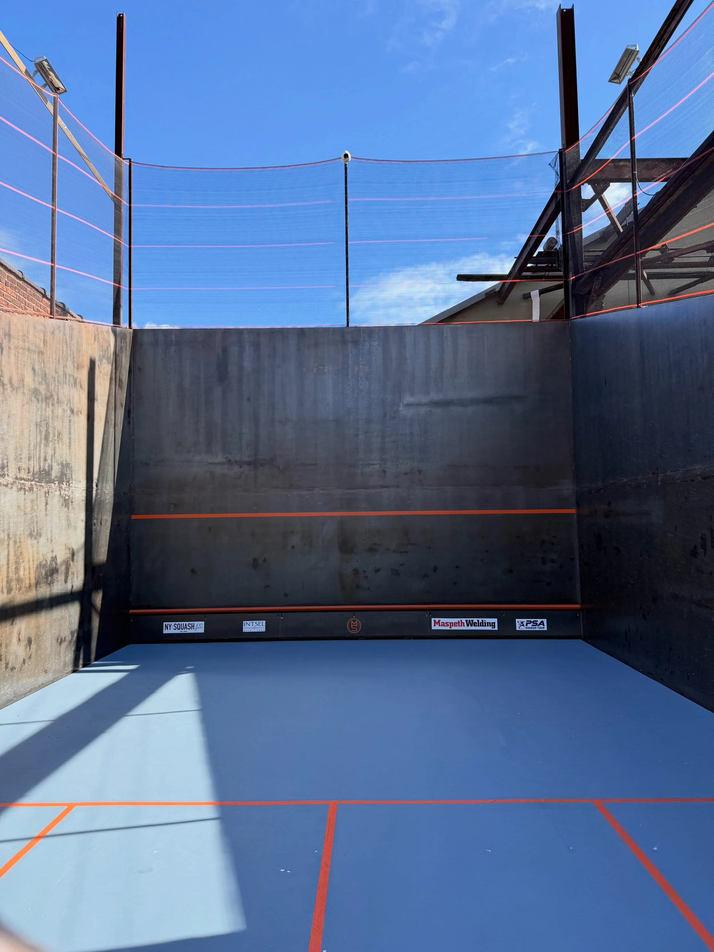 An outdoor squash court is unusual. 

Will yours be exceptional? We can help. MaspethSquash.com