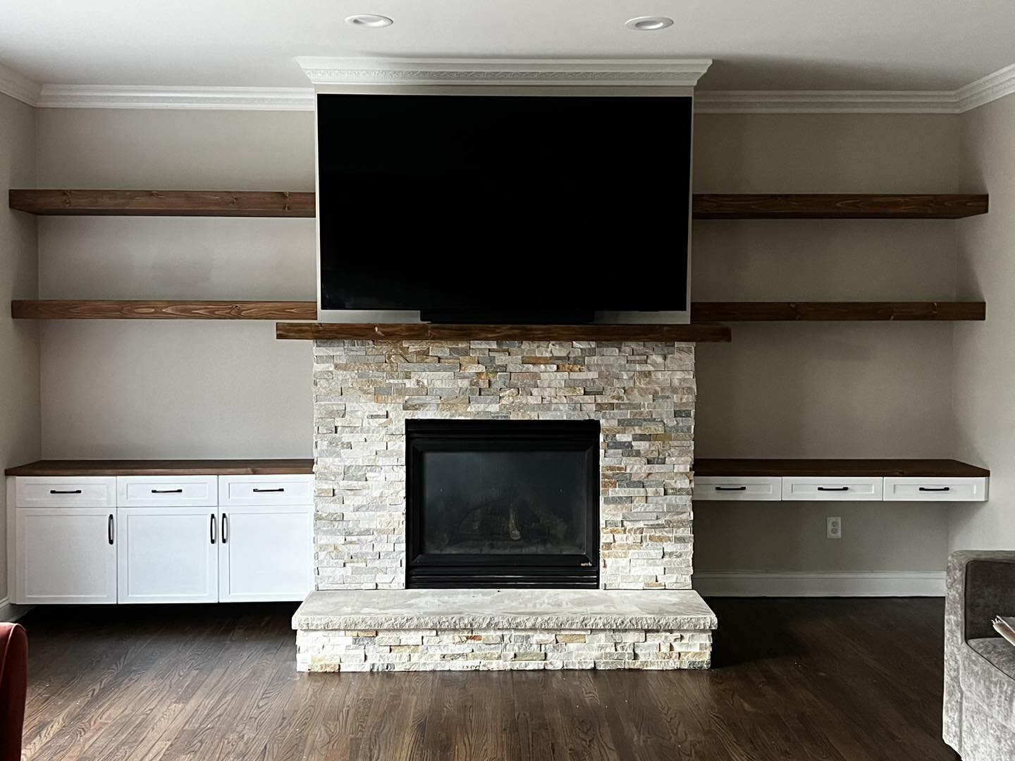 Built-in floating cabinets and desk with floating shelves. All the drawers and doors are soft close and the tops and shelves were made to match the existing fireplace mantle. 
.
.
.
.
#builtins #custommade #floatingshelves #interiordesign #livingroom
