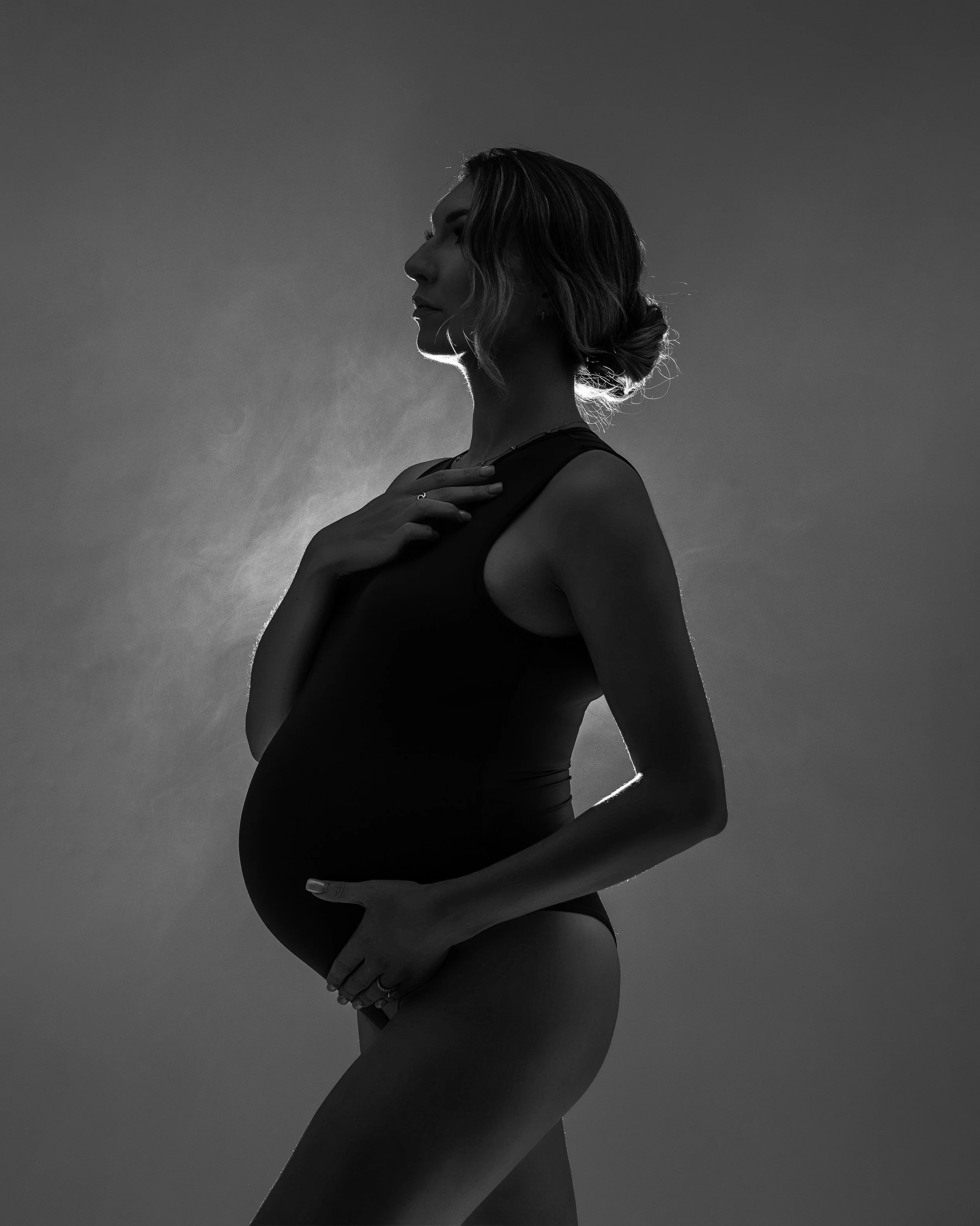 luxury-maternity-photography-rhode-island-professional-fashion-editorial-style-pregnancy-portrait-studio-haze-filled-room.jpg