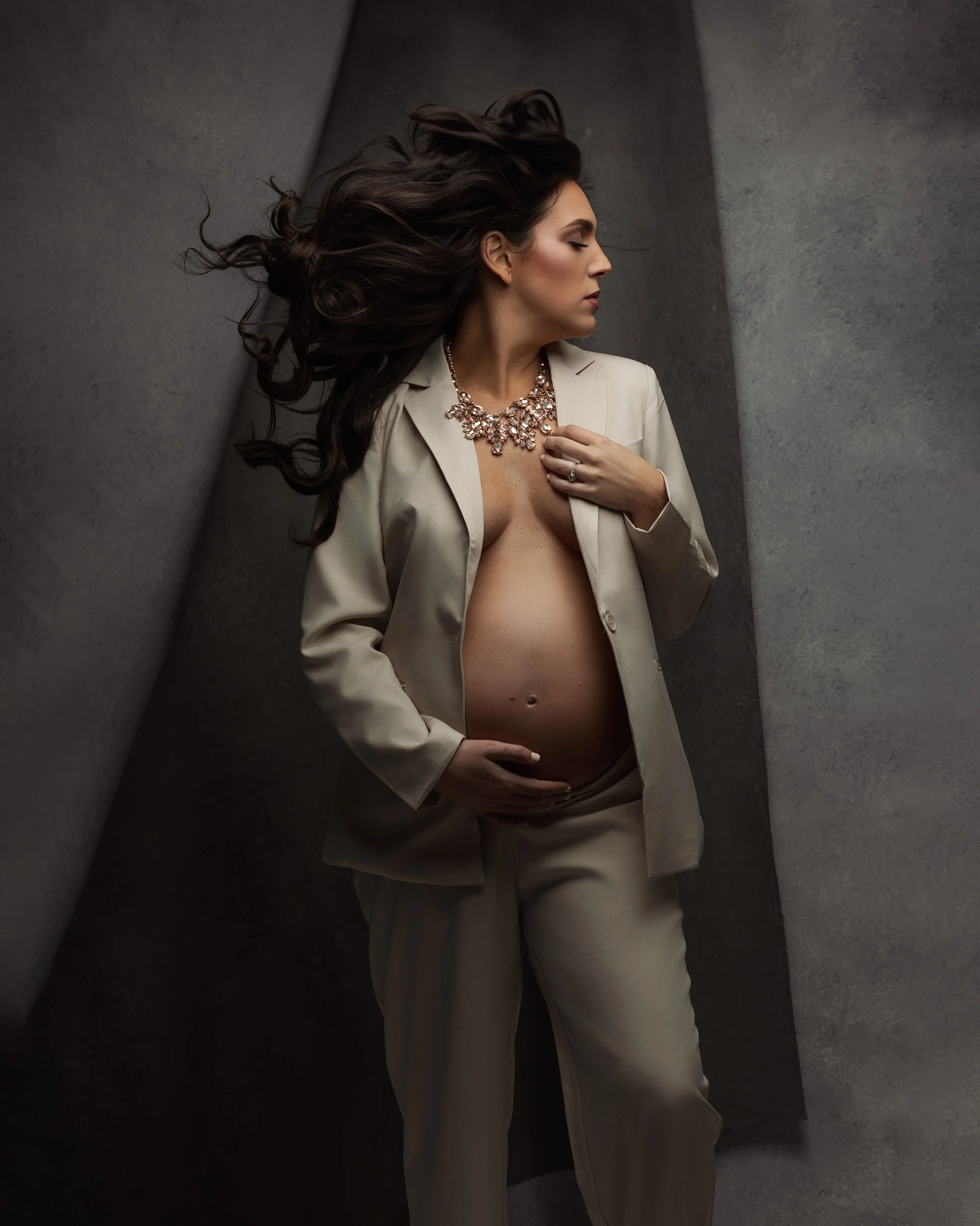 luxury-maternity-photography-rhode-island-professional-fashion-editorial-style-pregnancy-portrait-studio-pregnant-mother-business-suit.jpg