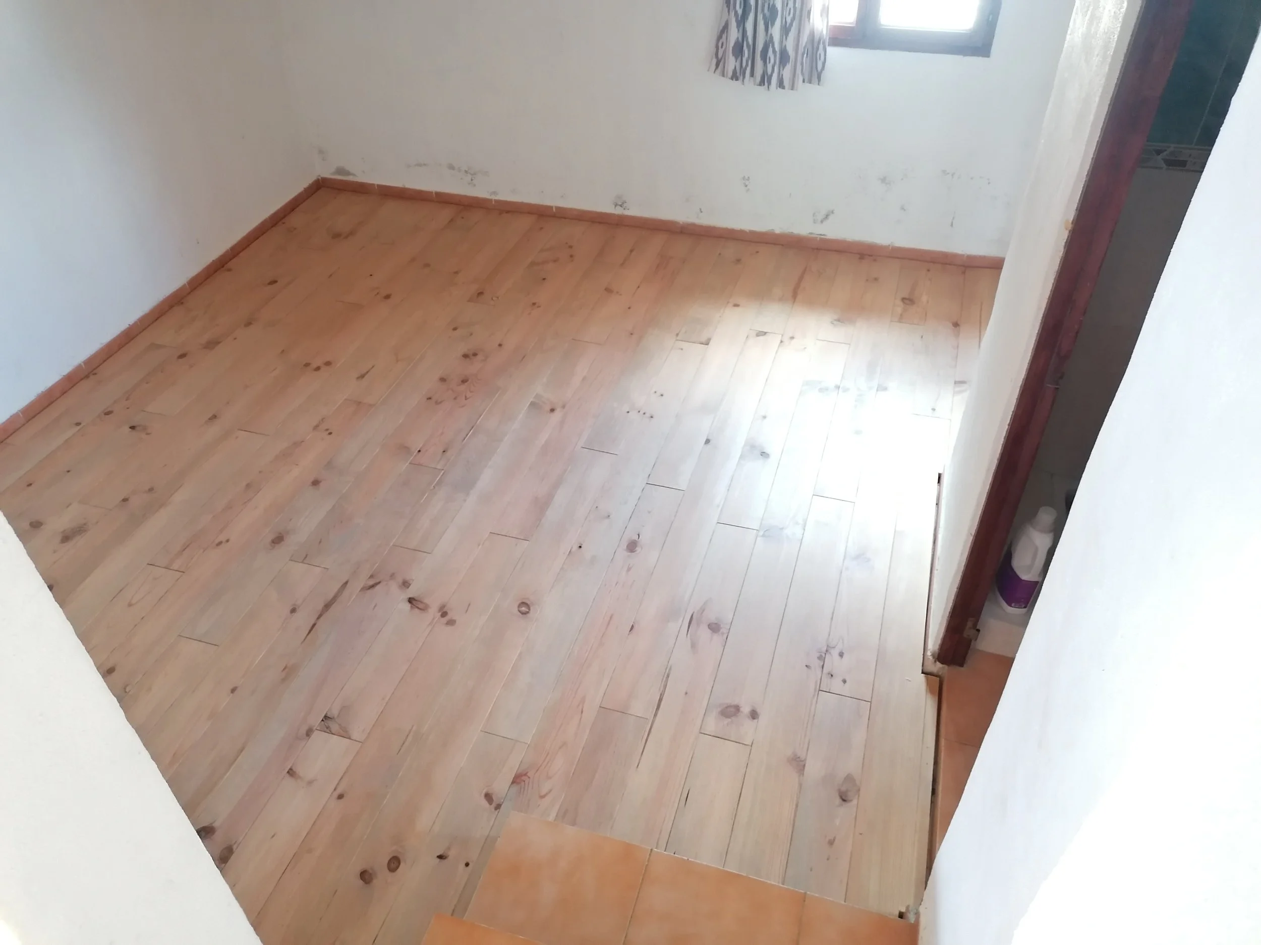 Finished – Completed floor in bedroom 