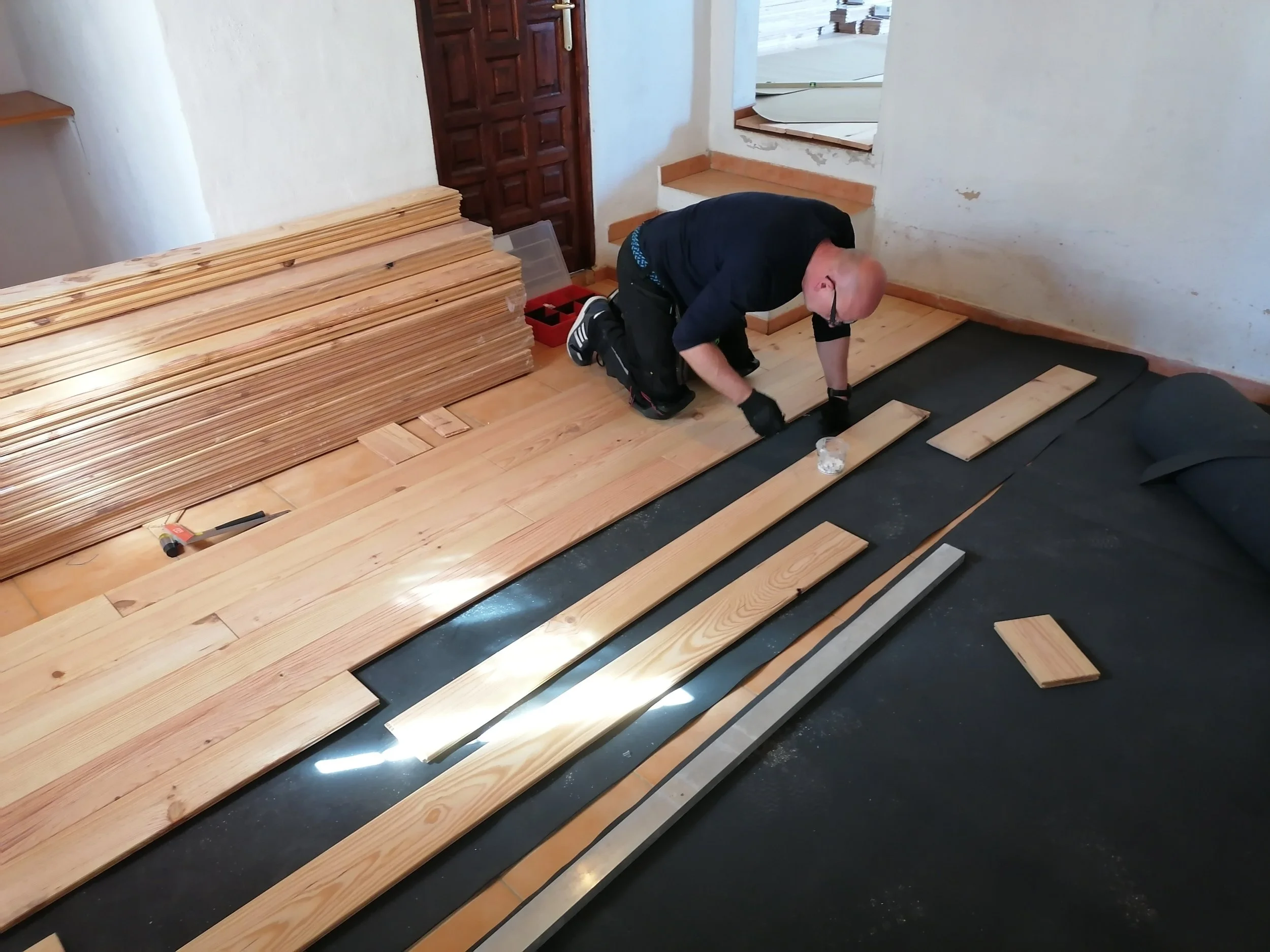 During – Laying wooden floor over tiles 