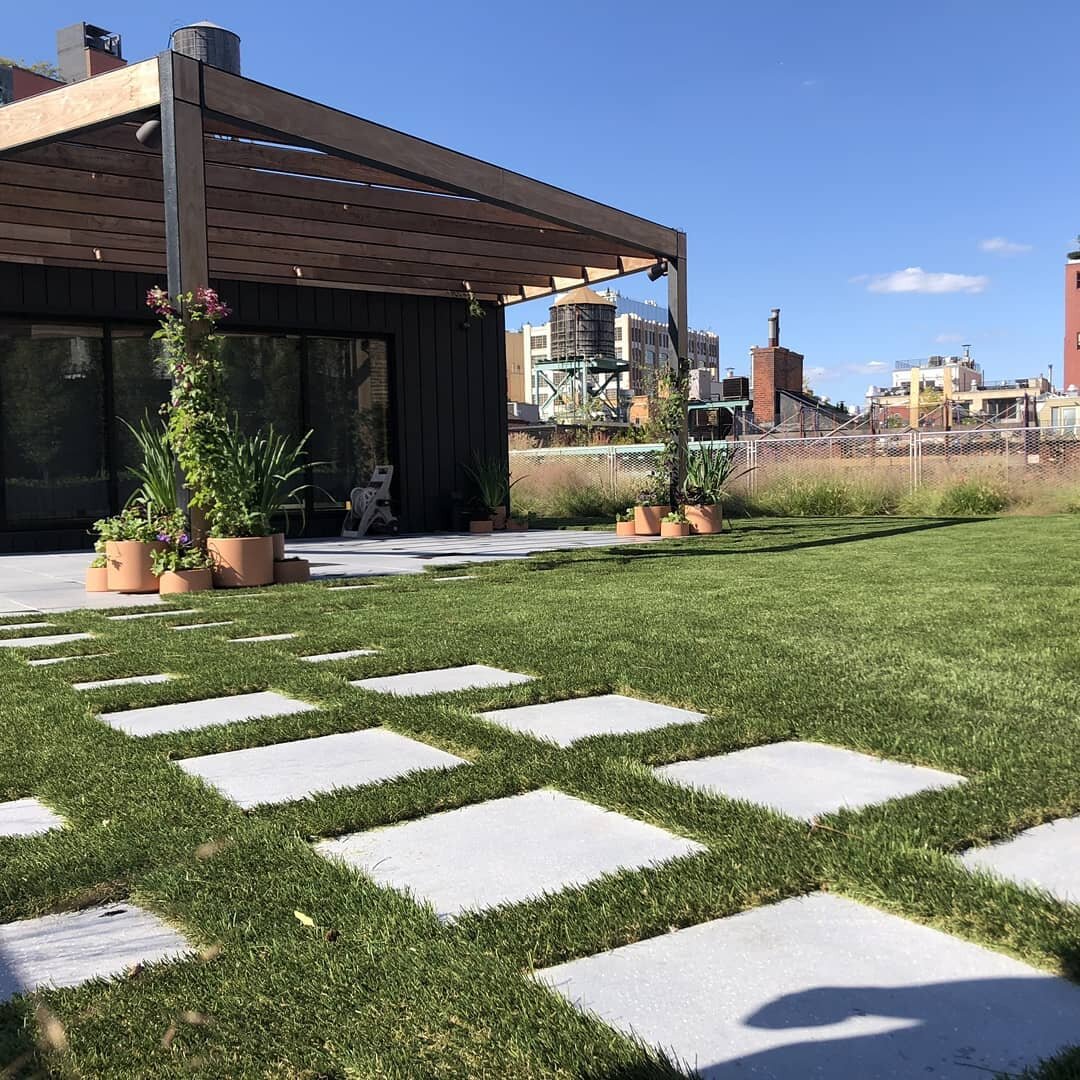 Putting the finishing touches on a beautiful september day to our rooftop garden in Tribeca