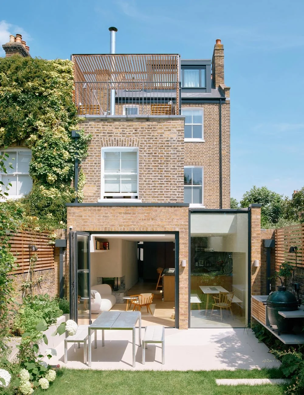 Renovated Victorian townhouse in North London with a contemporary extension by Paul Archer Design.