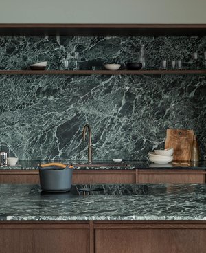 The elegant wooden kitchen with dramatic marble — Nordiska Kök