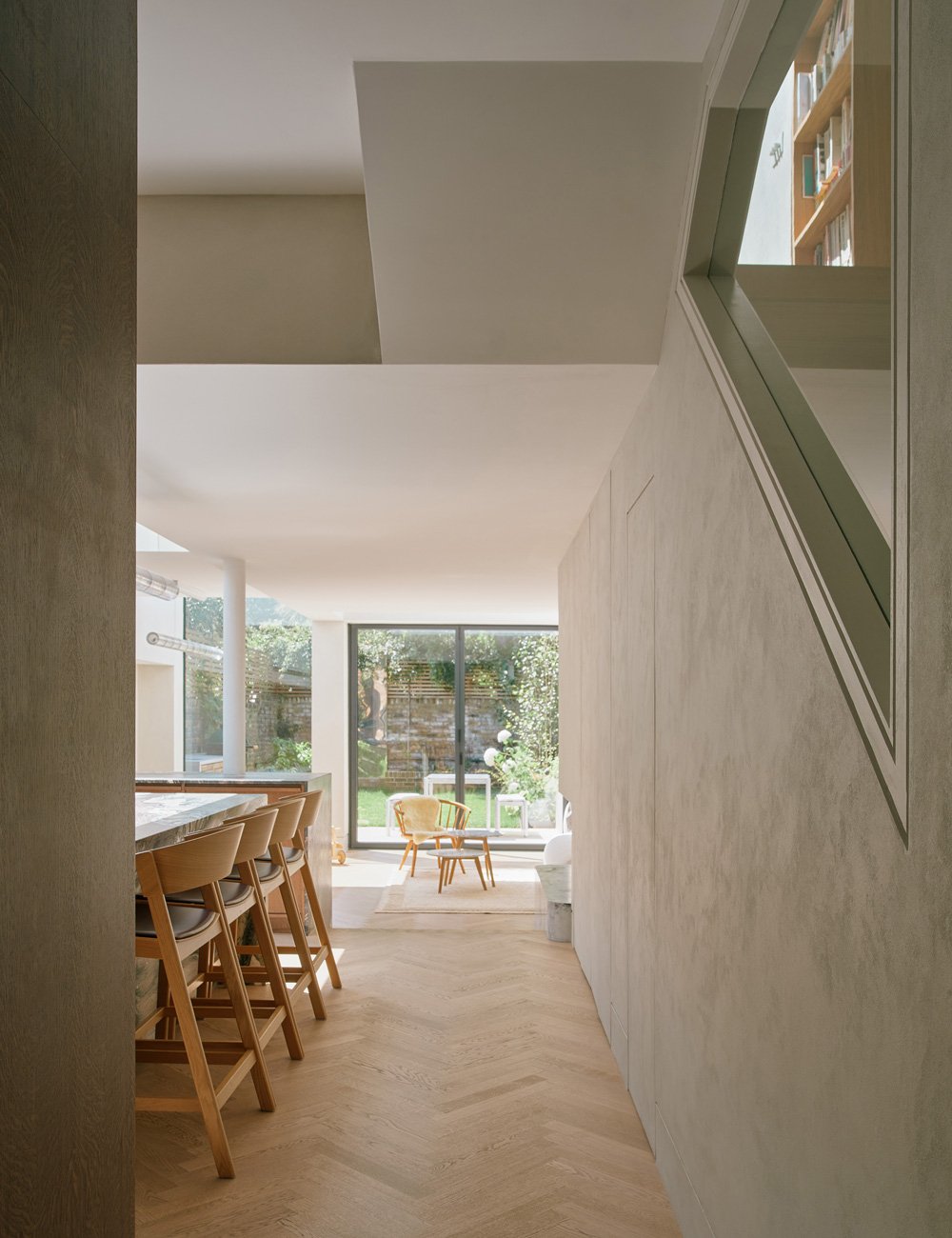 Open-plan kitchen and living space in a renovated Victorian townhouse, opening towards the garden.