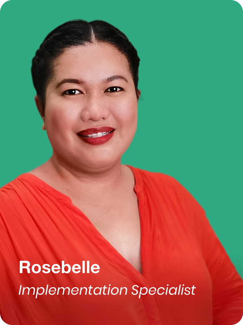 A woman with dark hair styled in braids, wearing a red blouse, smiling, with a green background.
