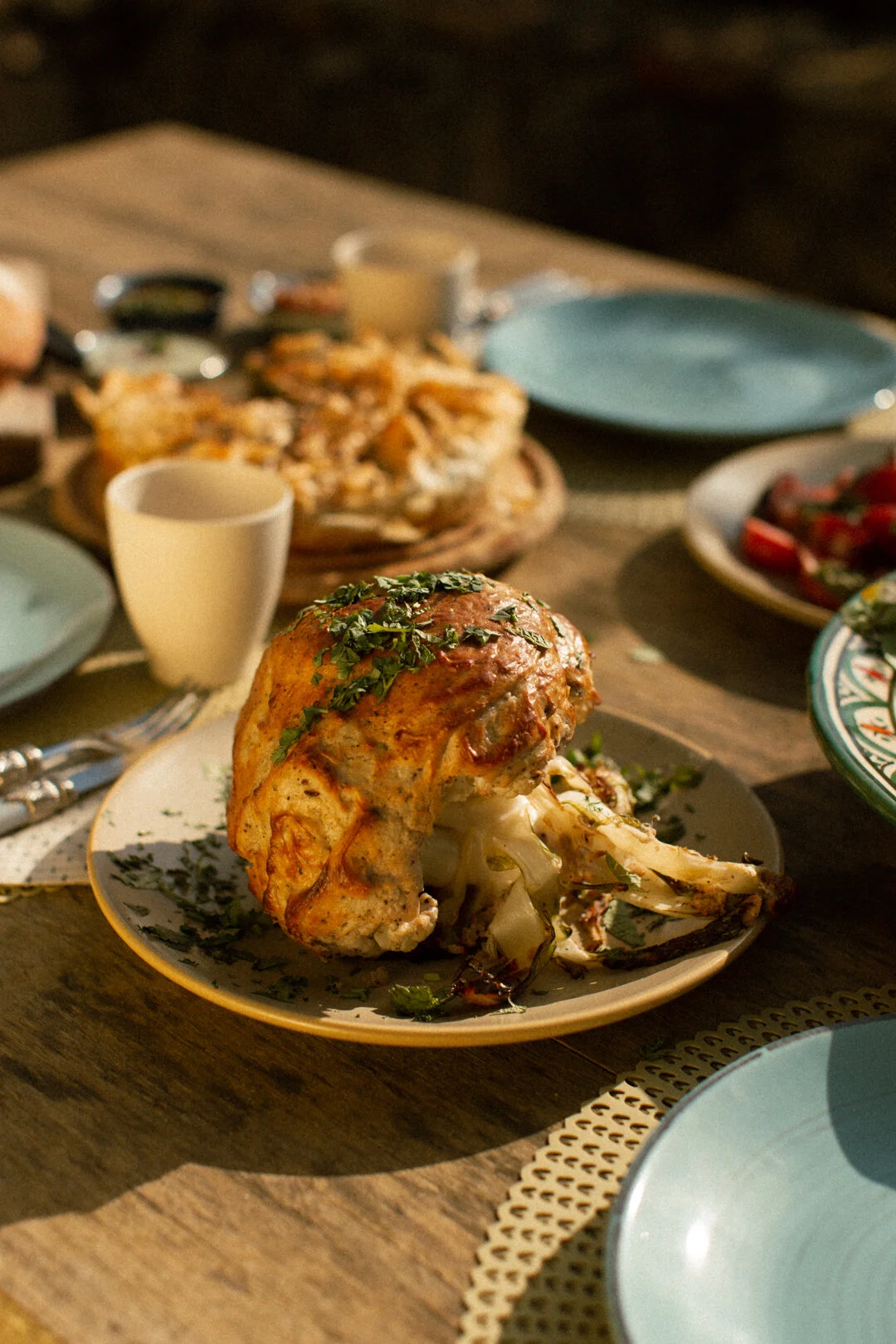 Whole roast cauliflower in yoghurt tahini crust