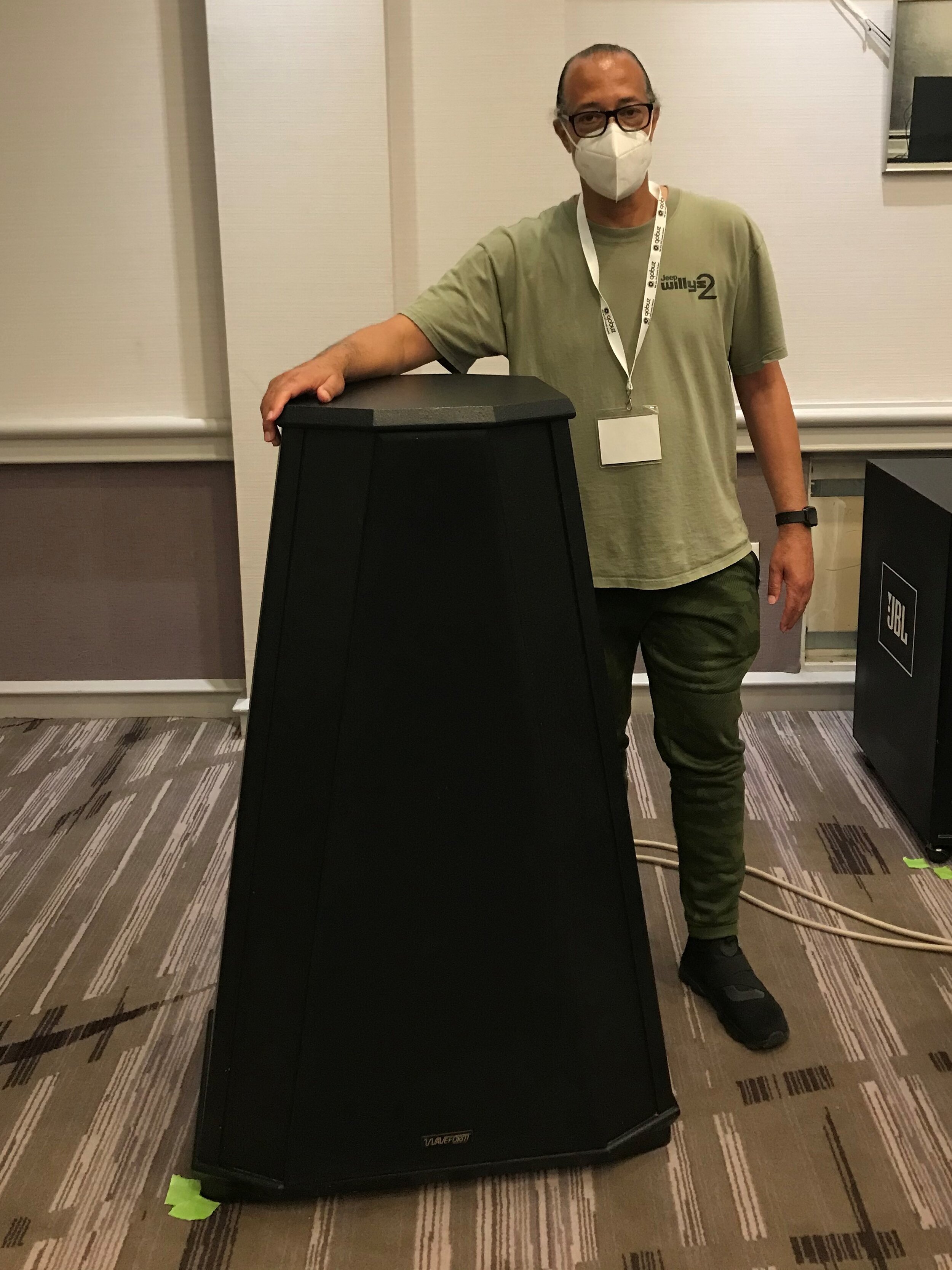 Audio designer and consultant Wayne Carter of San-Diego-based Wayne Carter Audio posing with a Waveform Mach 13 loudspeaker