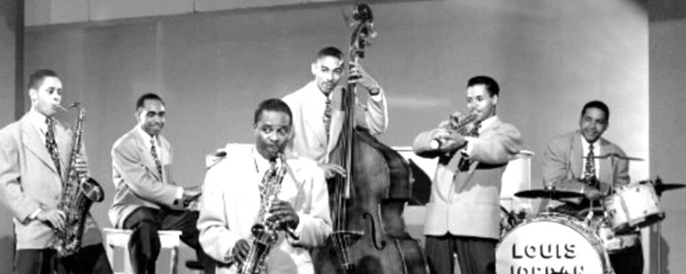 (source photo inconnue)Louis Jordan jouant du jump blues