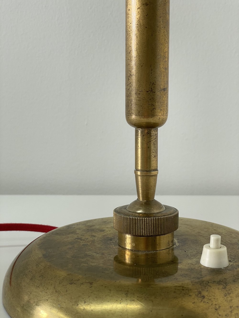 Italian Design: Oscar Torlasco Brass Articulating Table Lamp with Red Shade  — Katch Interiors