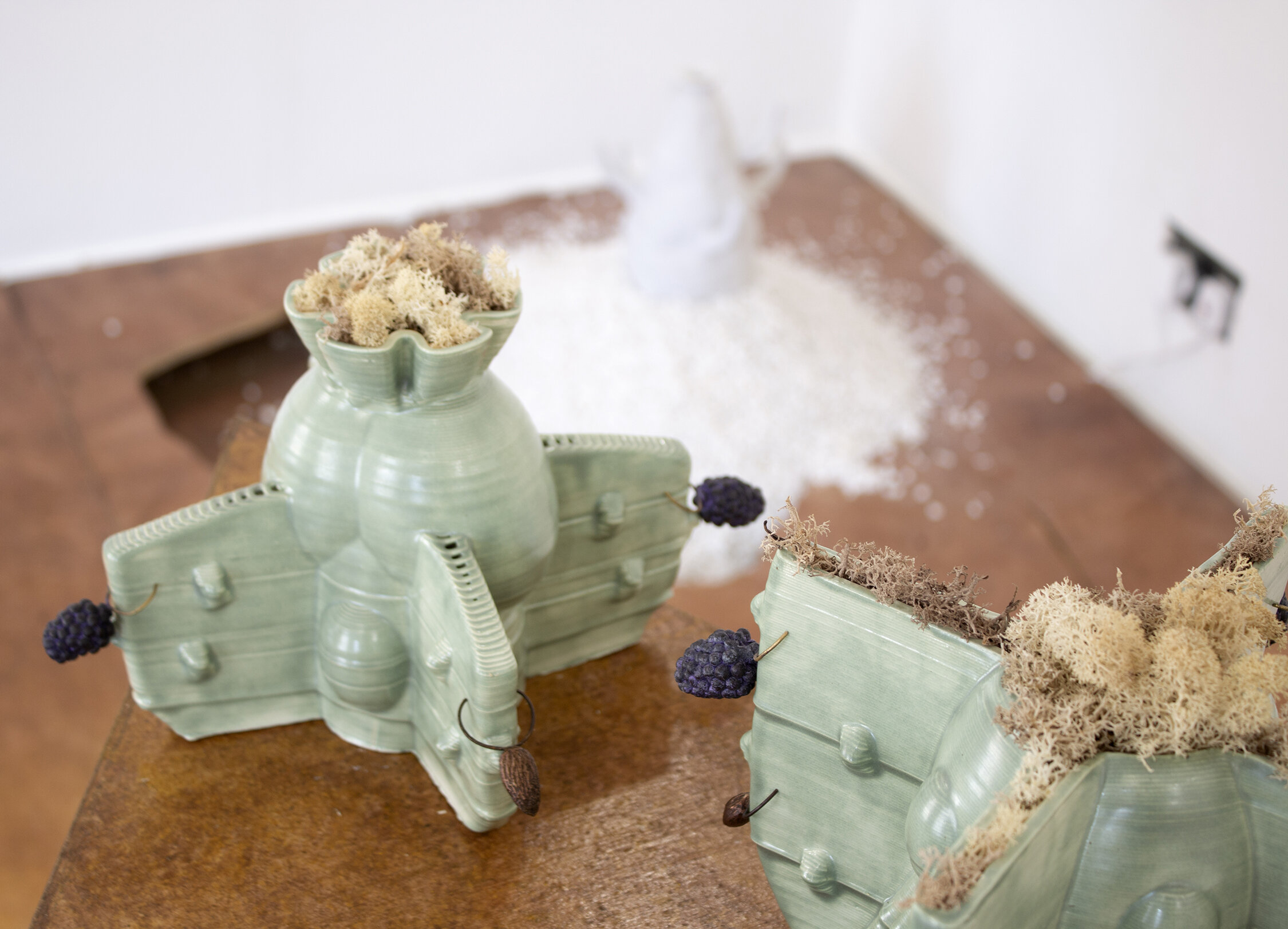 Detail of: Bellarmine’s Hereafter, 3d printed porcelain, glaze, bronze, moss,
dimensions variable, 2021, Sophie Goodchild