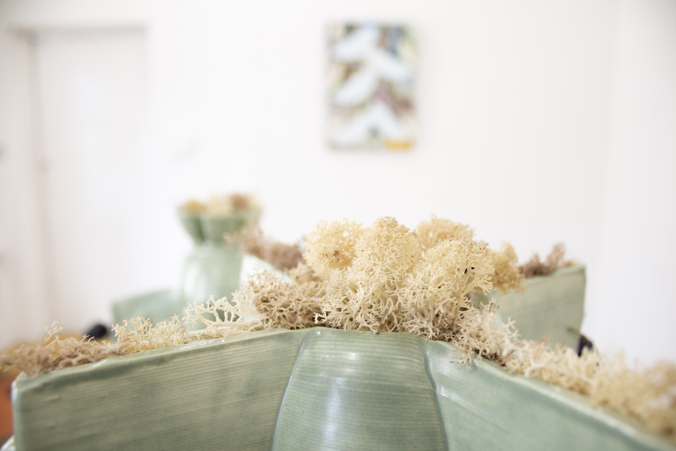Detail of: Bellarmine’s Hereafter, 3d printed porcelain, glaze, bronze, moss,
dimensions variable, 2021, Sophie Goodchild