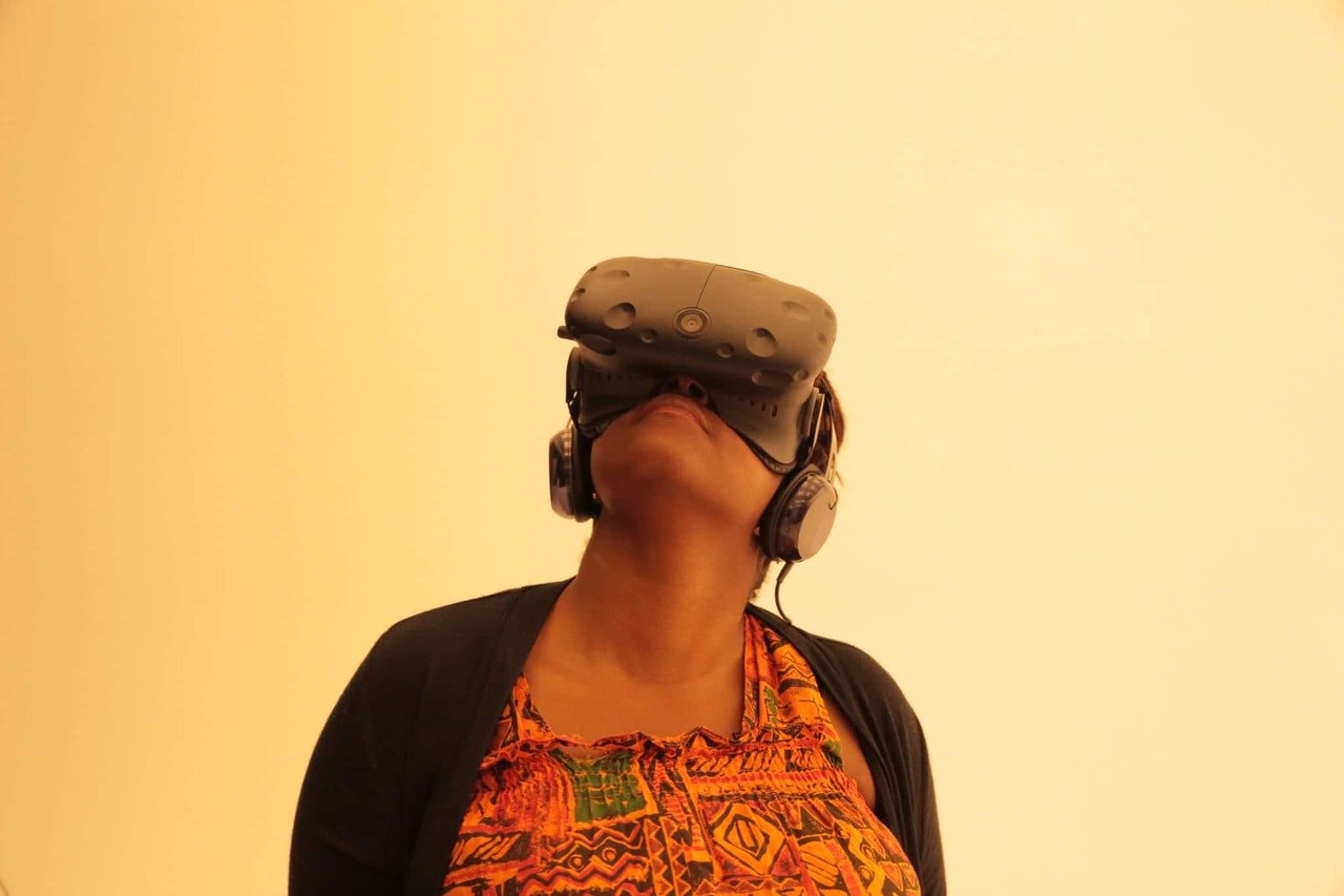 Woman-with-virtual-reality-headset-on -photo-via-nappy.co-1280x854.jpg