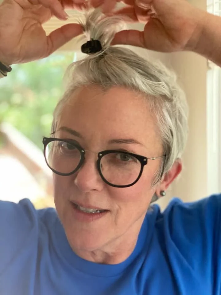 Resurrection of the “Pebbles,” now called the Apocalypse Up-Do. It has gained me great respect at the nursery.