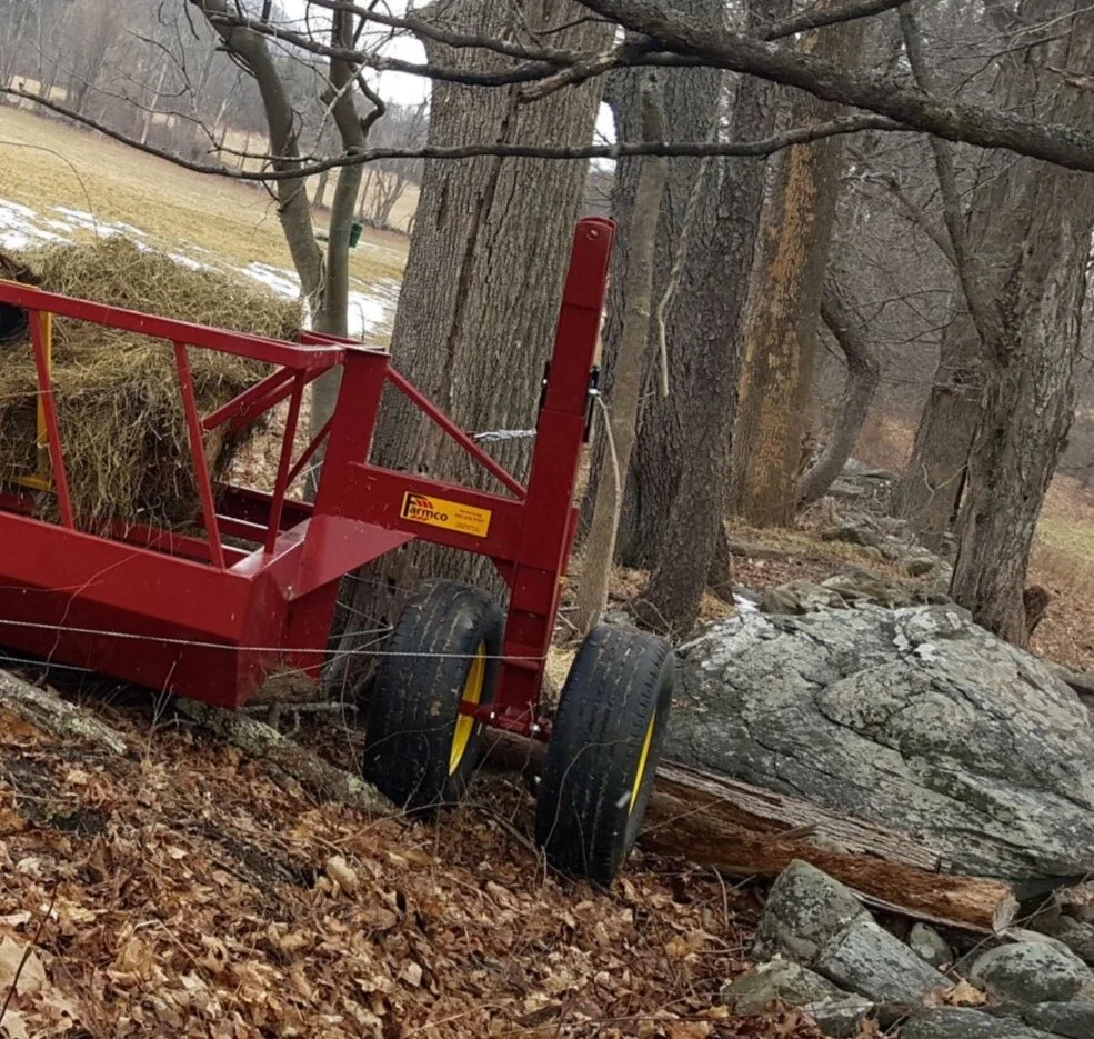 Uh-Oh.  New Hay Wagon Crashed by the Cows