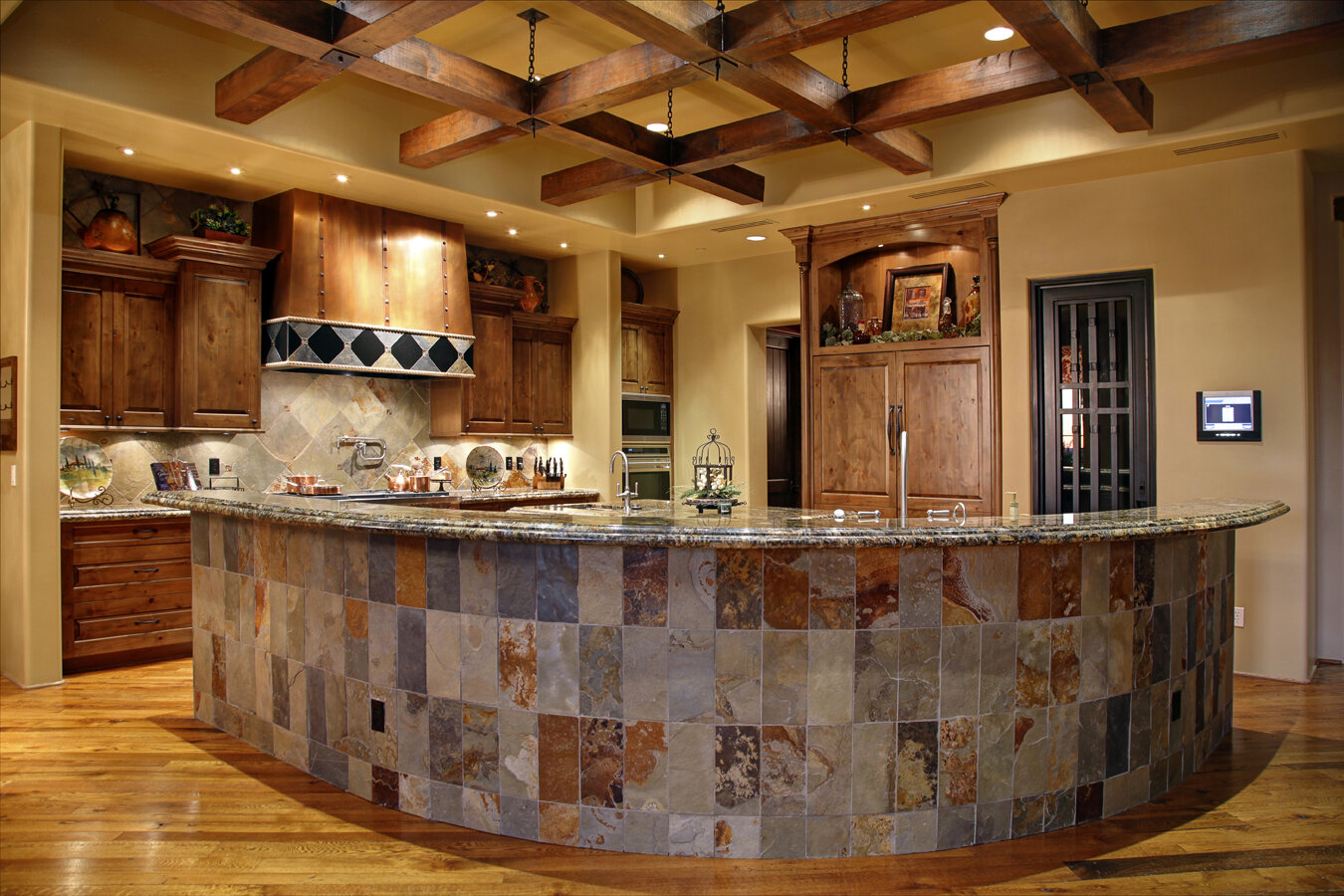 009 The Kitchen at the Show Home.  The Wine Room is located through the wrought iron door_6847.jpg