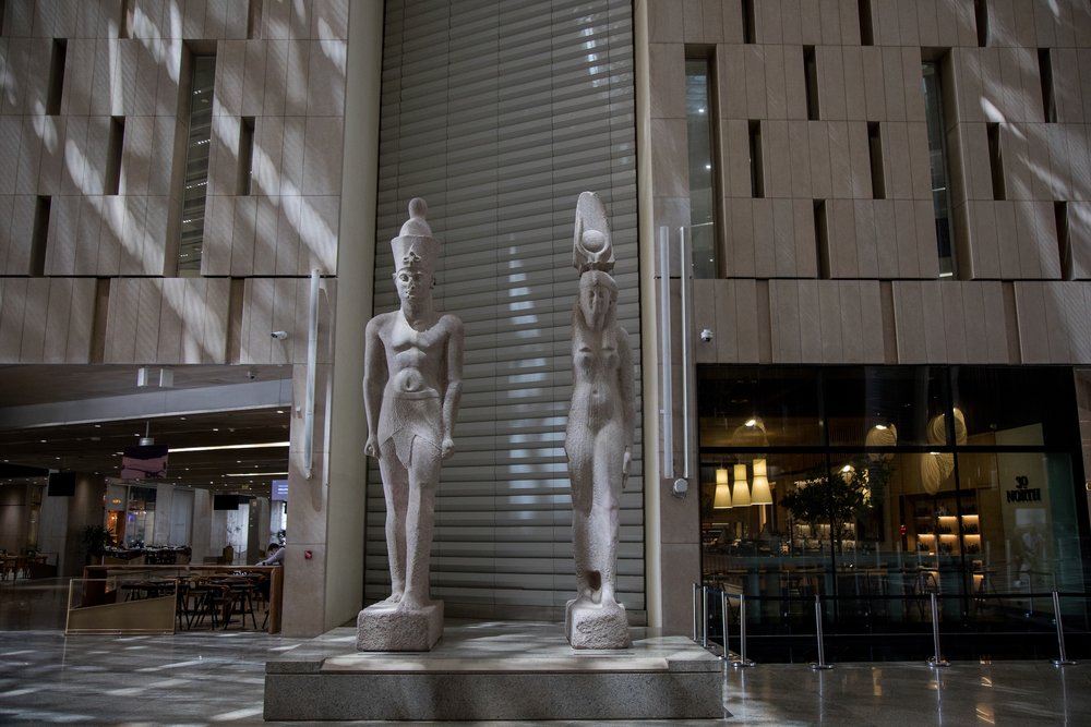  Collosal statues from the sunken city of Thonis-Heracleion, displayed in the entry hall of the Grand Egyptian Museum in Giza, near Cairo.   ©Hilti Foundation, photo&nbsp;: Fadel Dawod  