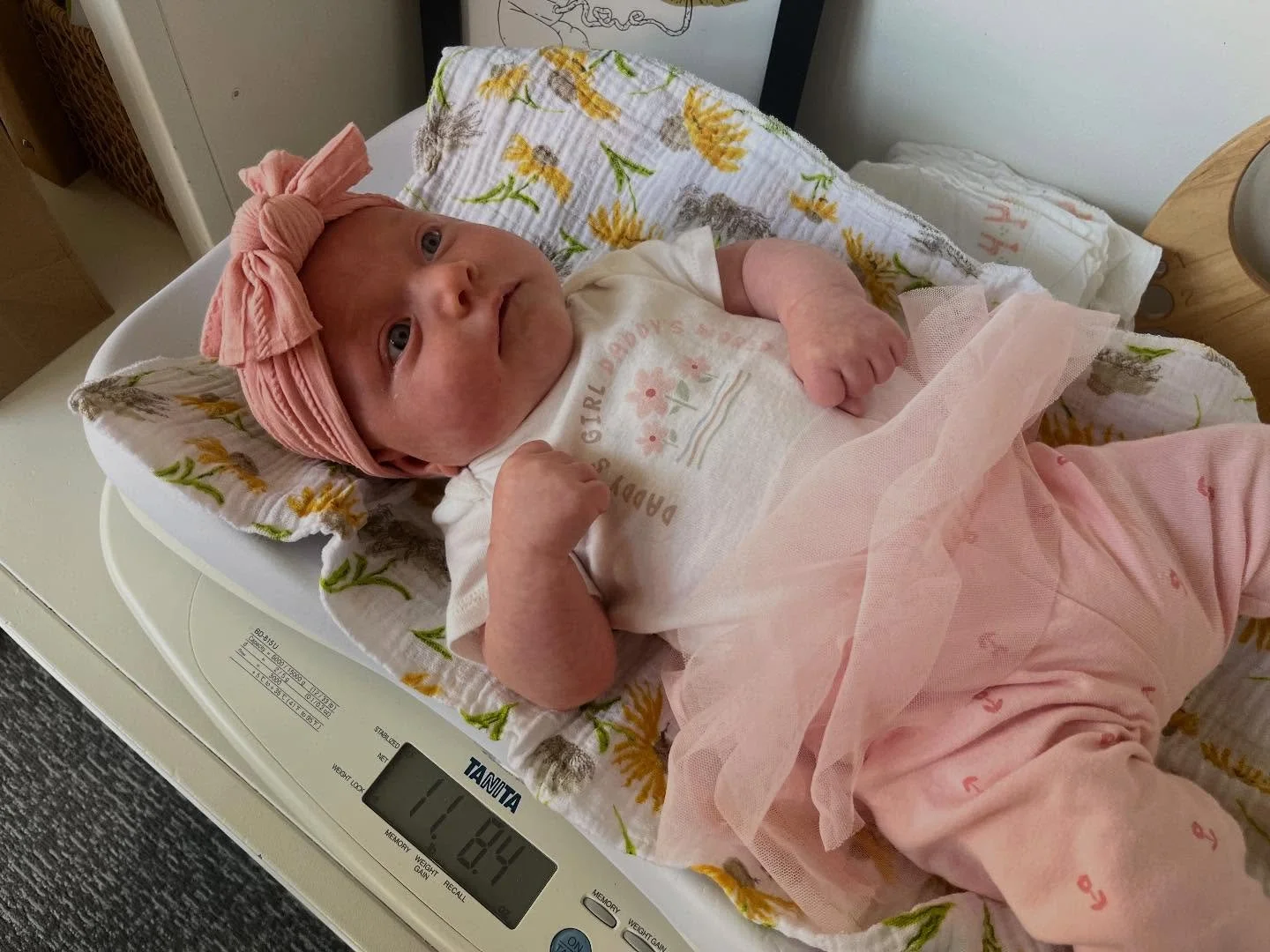 This beautiful little girl is growing and thriving! Her two big brothers love her. She is so calm and sweet and it&rsquo;s a pleasure to see her be so healthy and content. Thanks for coming to see us, little one! We love you! -Midwife Bethany and the