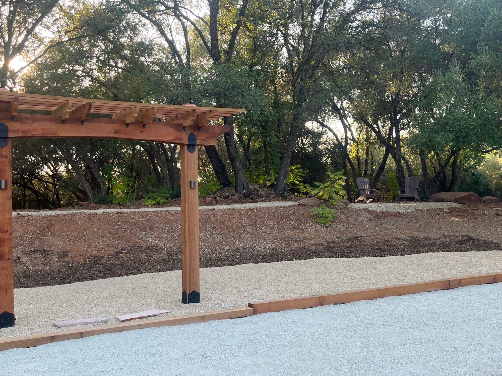 Pergola and paths custom built by Earth care Design and Construction