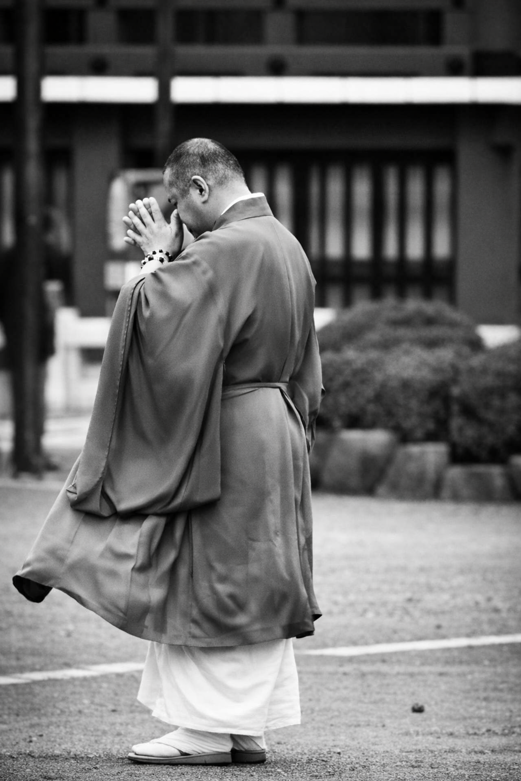 Praying in Asakusa.png