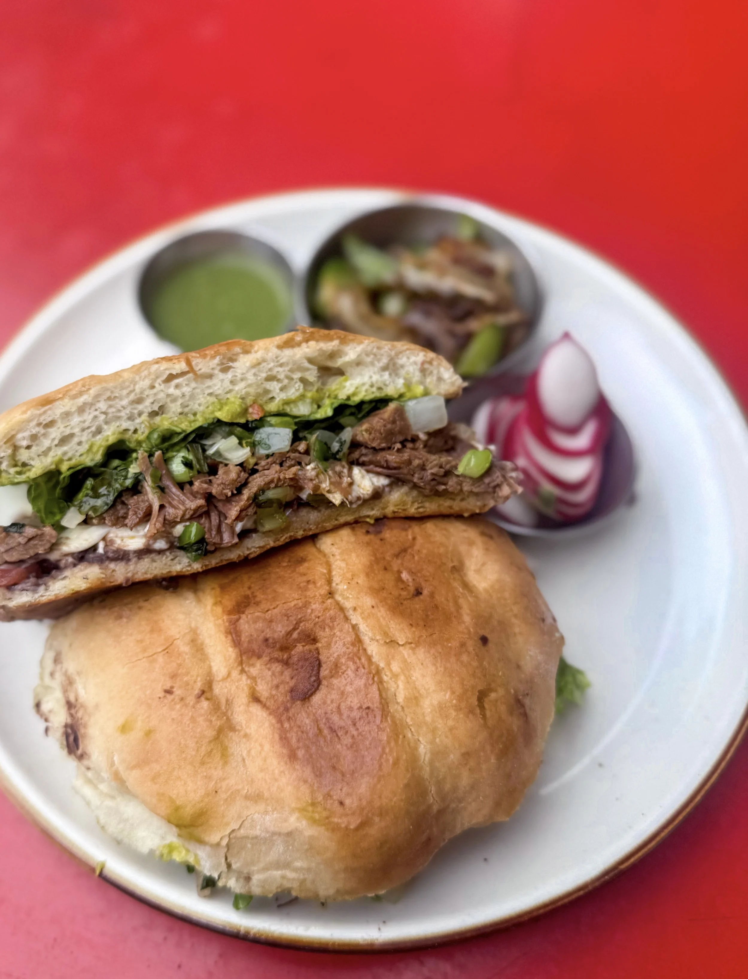 Brisket Torta - In-house made sauces, fresh baked Telera bread