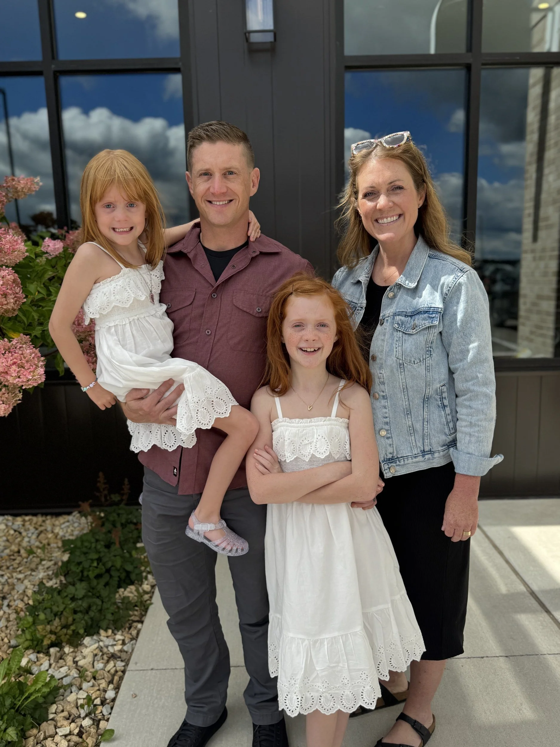 Tom and Amanda Lovett with daughters Vivian and Alice