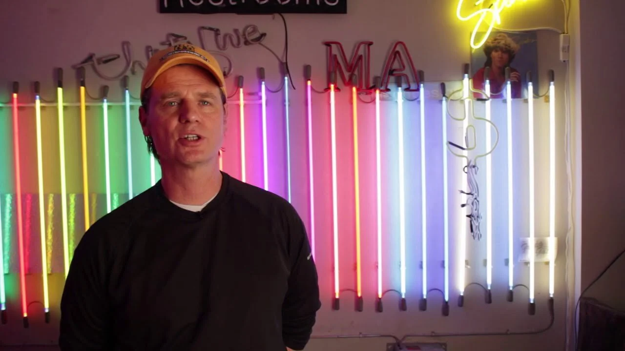 Charlie Evanson brought his unique business, Neon Design, to the 8th Ward from his Wrigleyville location.