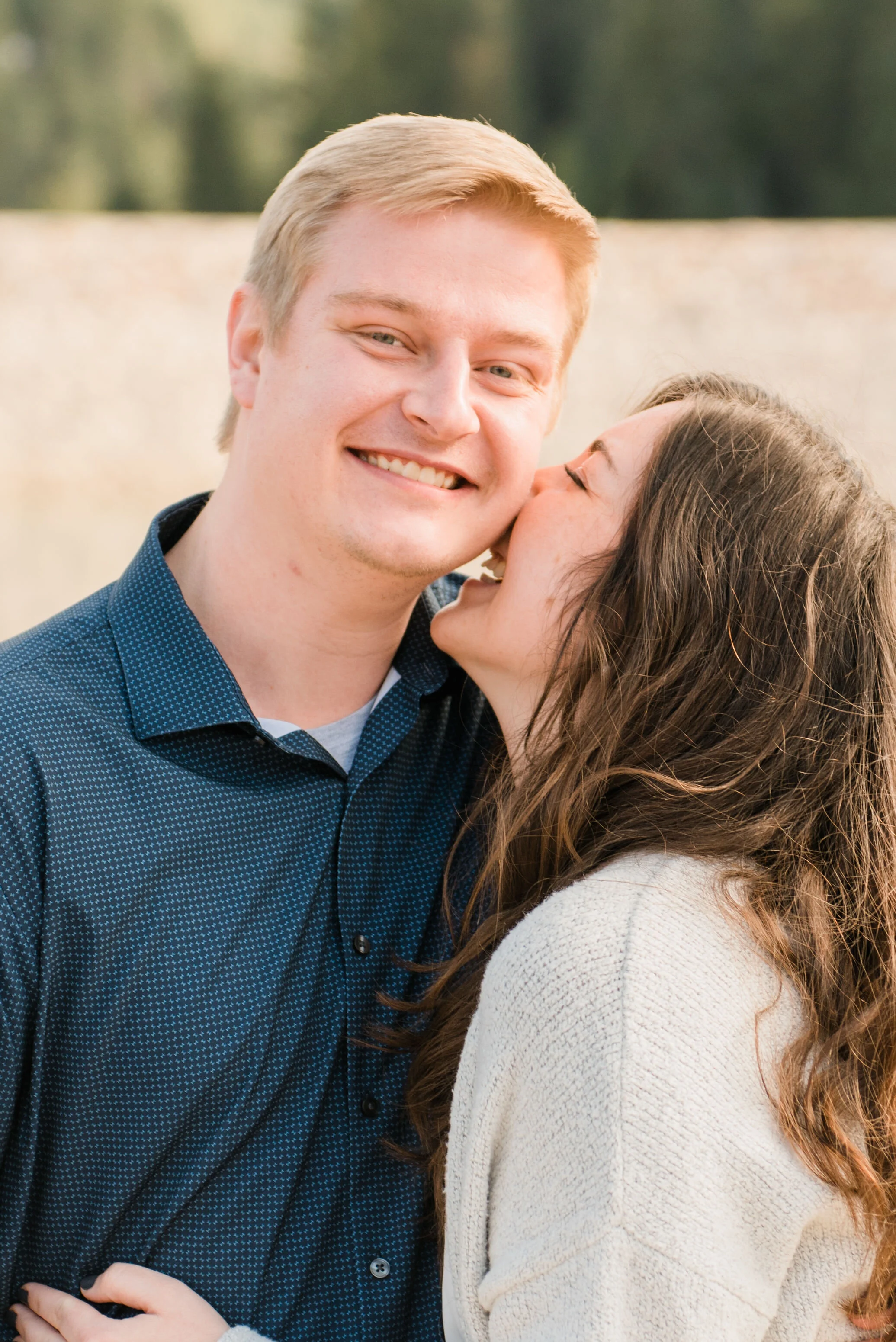 At this playful winter engagement session in Maryland, Jacquie Erickson Photography captures couple laughing and playing together. navy and cream engagement color scheme photos, professional maryland engagement photographer, maryland winter engageme