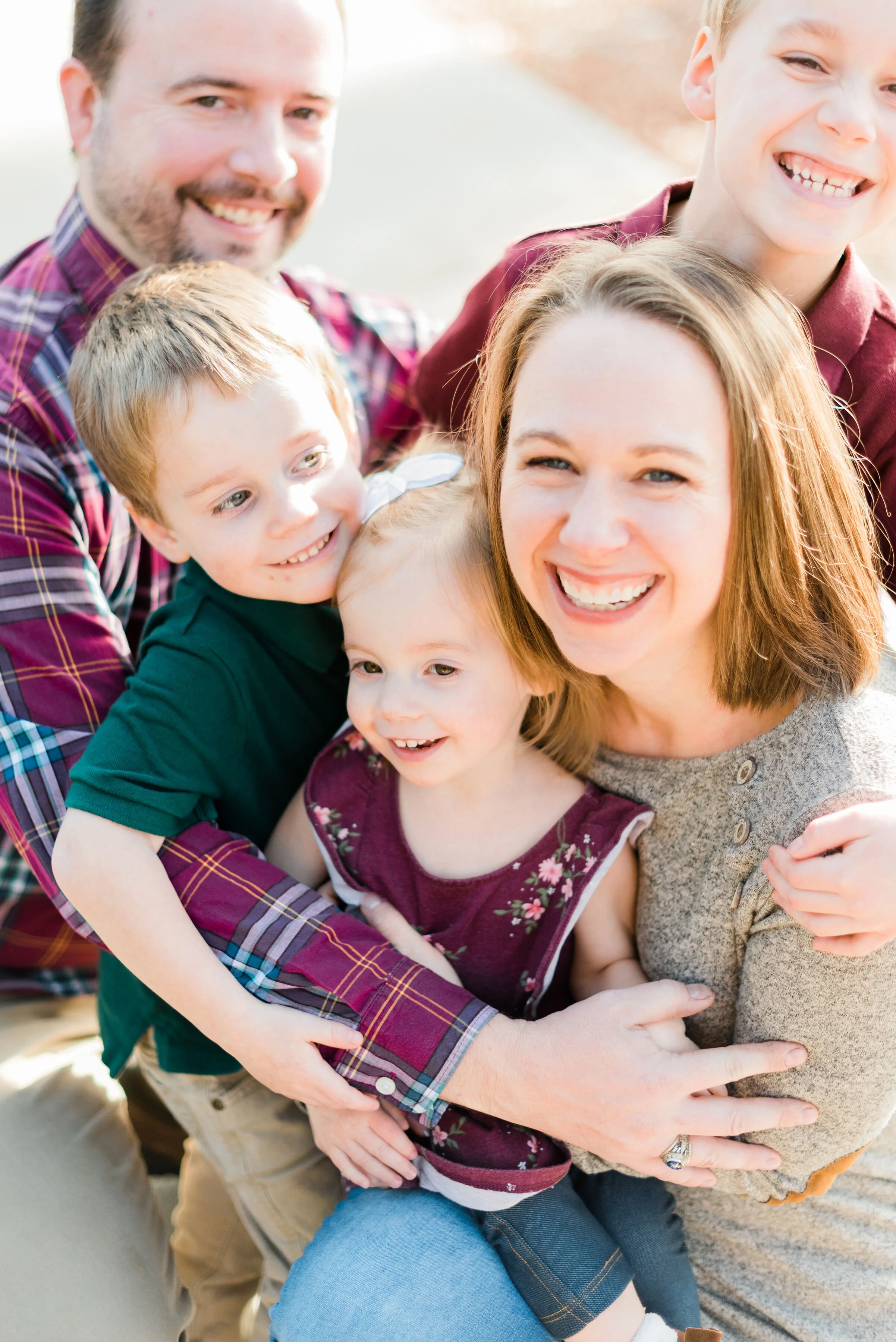  A family that plays together receives these cute candid pictures by Jacquie Erickson Photography taken in Frederick, Maryland. Squishy cheesy candid picture poses inspo fall time photography semi-formal outfit inspo parents and children family of fi
