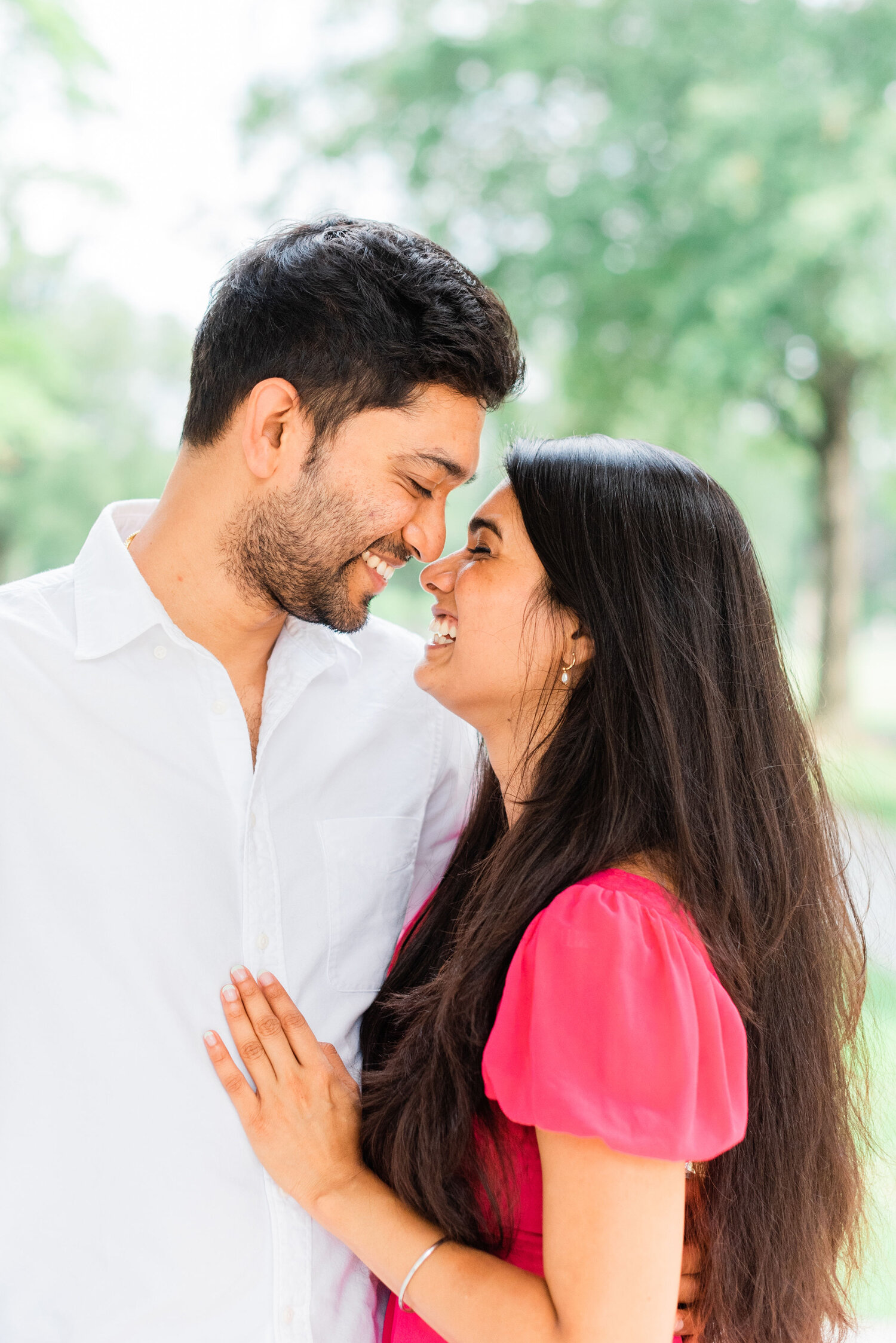  Darling photo of a newly engaged couple with their noses touching radiating with joy about being engaged by Jacquie Erickson Photography in Washington DC. couples in love radiant smiles surprise engagement photos #jacquieericksonphotography #jacquie