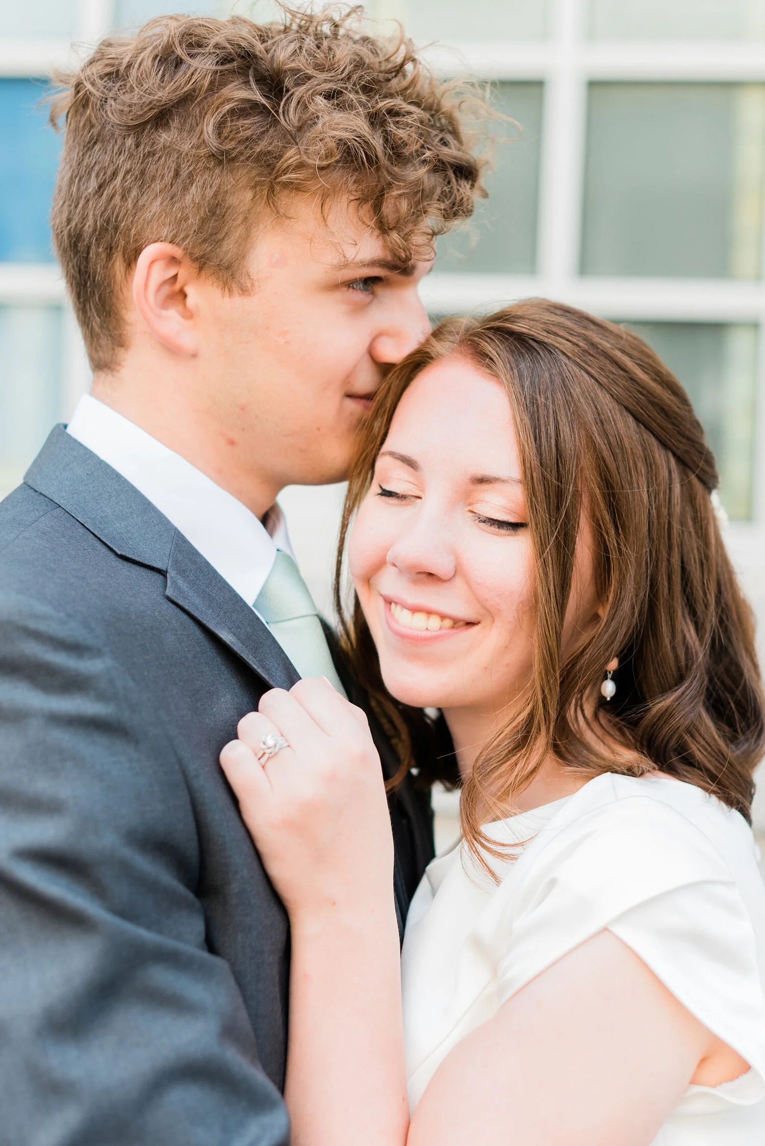  A lovely LDS wedding in Philadelphia, PA shot by Jacquie Erickson Photography. Summer wedding pictures outdoor wedding photos LDS wedding inspiration wedding dress with sleeves unique wedding dress bridal hair inspiration bride and groom pose ideas 