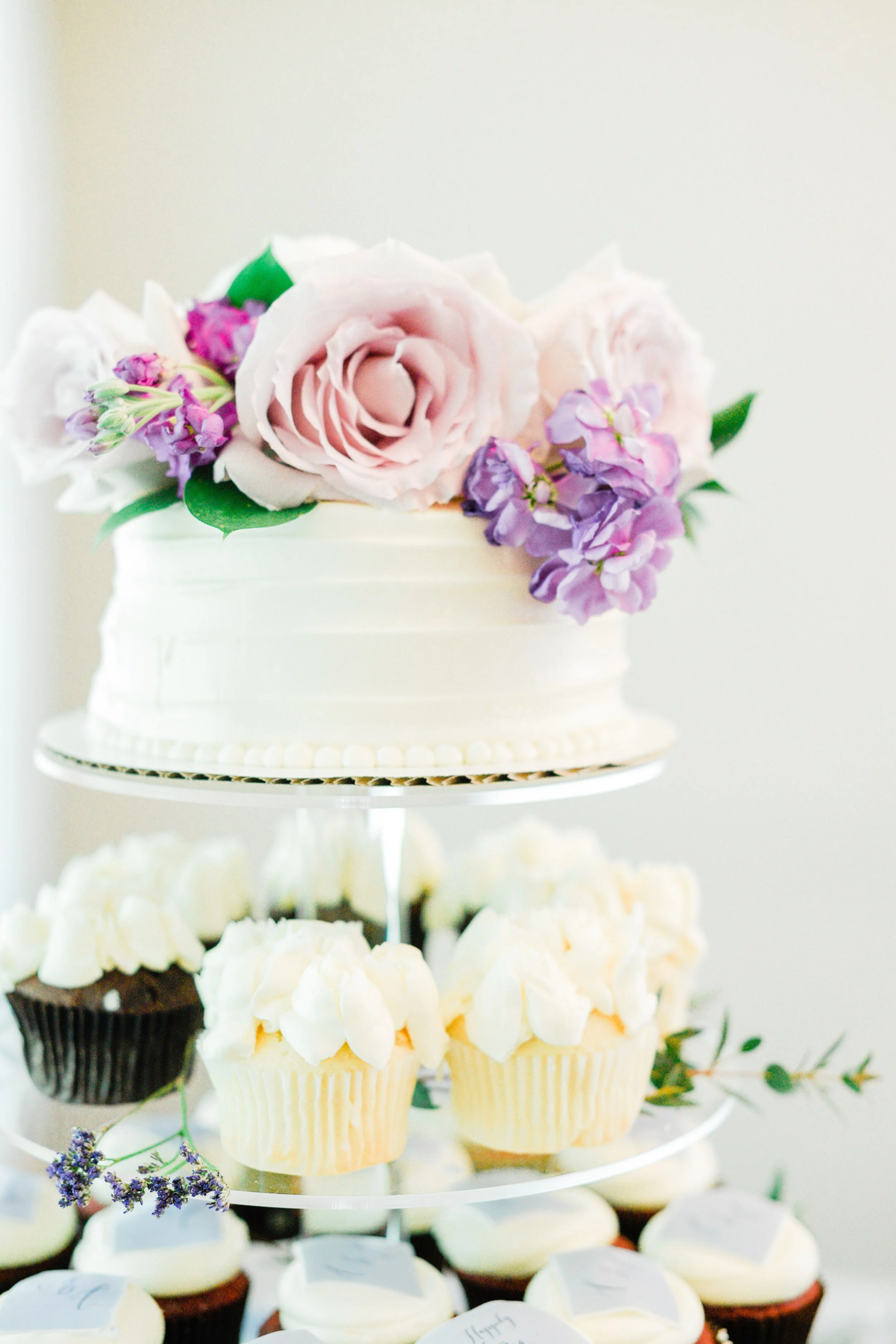  Two-tier white buttercream ruffled cake with fresh flowers captured by Jacquie Erickson Photography. buttercream cake simple wedding cake fresh flowers on wedding cakes #JacquieEricksonPhotography #JacquieEricksonWeddings #SpringDCWedding #SpringWed