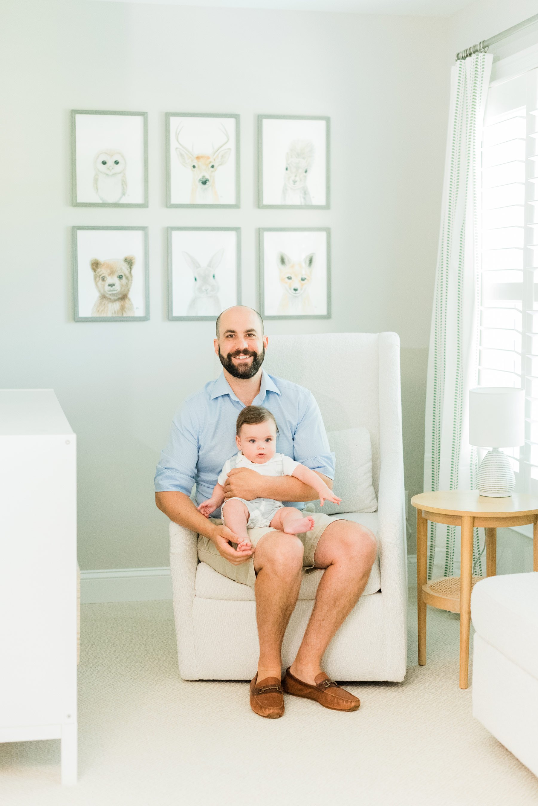  A sweet dad sits with his young son in the son’s nursery. Jacquie Erickson photography takes pictures that last a lifetime.&nbsp; #inhomeportraitsessions #familyphotos #portraitphotography #atlantaphotographer #jacquieerickson #fayettevillefamilypho