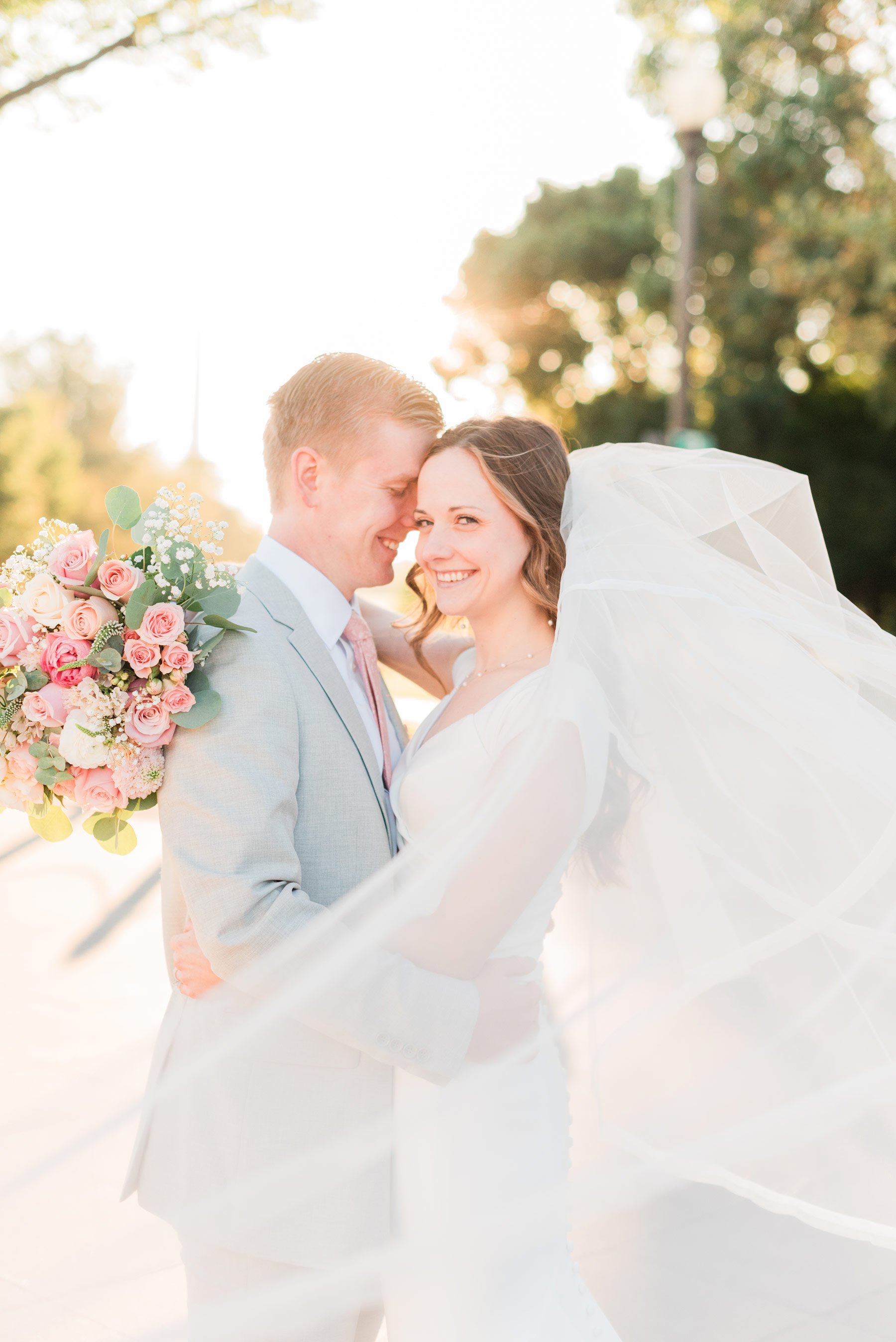    A stunning sunset bridal photo that highlights the LDS bride’s beautiful veil. #washingtondcphotography #washingtondctemple #washingtondcwedding #dcweddingphotographer #washingtondctemplewedding #eastcoastweddingphotographer #sunsetbridals #modest