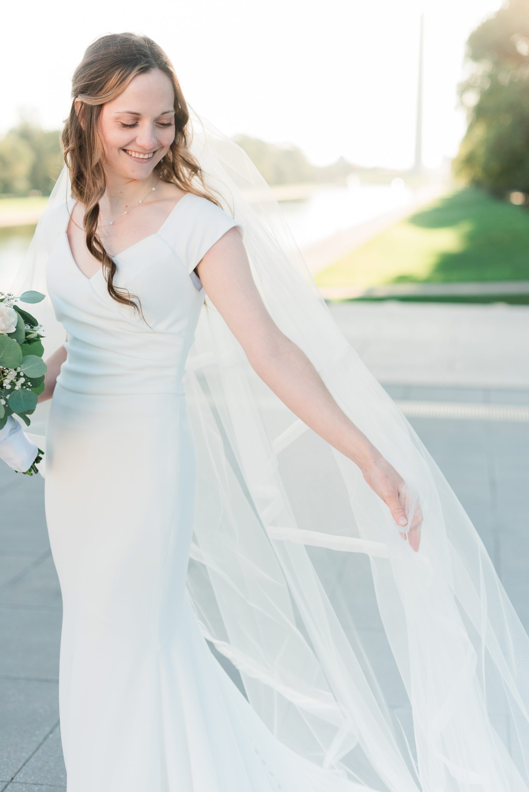    A beautiful veil shot with the Washington Monument featured in the background. #washingtondcphotography #washingtondctemple #washingtondcwedding #dcweddingphotographer #washingtondctemplewedding #eastcoastweddingphotographer #sunsetbridals #modest