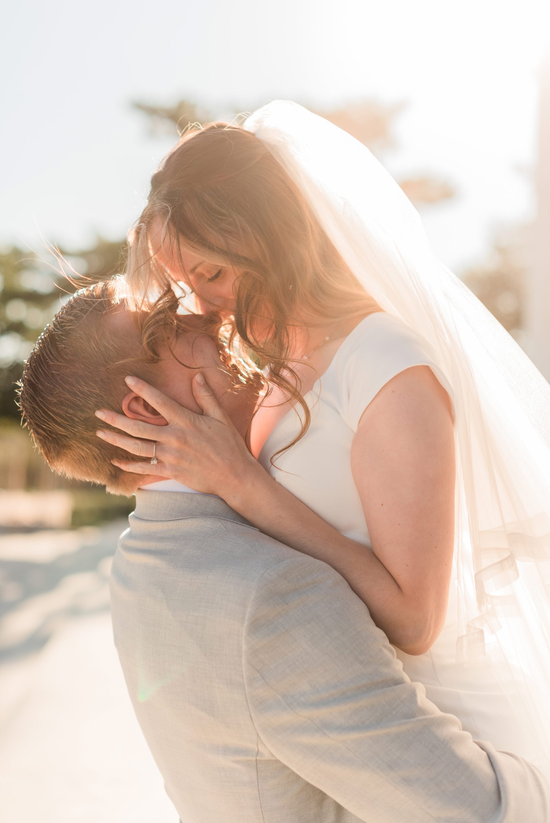    A romantic wedding photo of the bride and groom nearly kissing in the golden hour light. #washingtondcphotography #washingtondctemple #washingtondcwedding #dcweddingphotographer #washingtondctemplewedding #eastcoastweddingphotographer #sunsetbrida