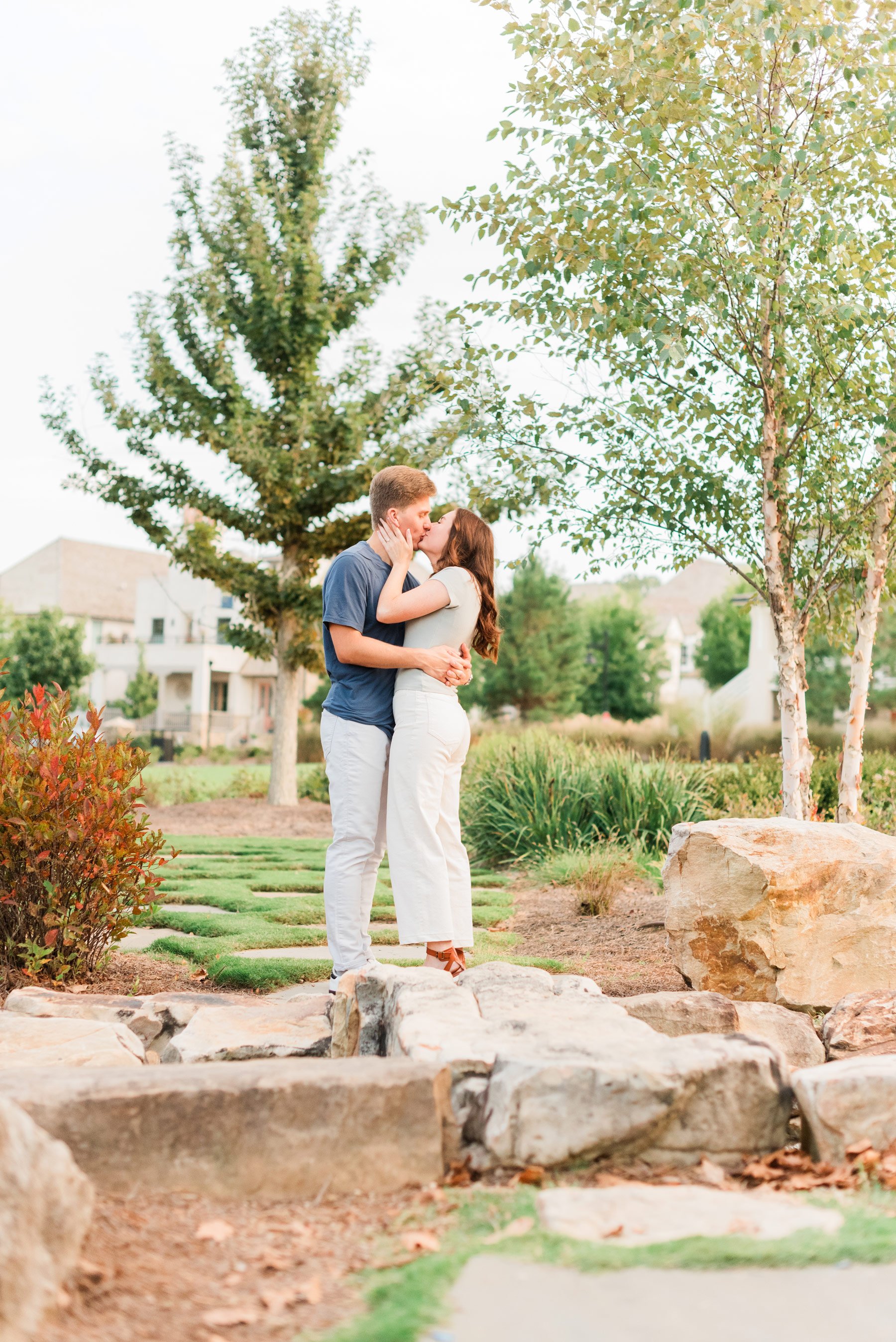    This sweet engaged couple shares a kiss in the park during their Fayetteville engagement session. #trilithstudios #georgiaweddingphotographer #fayettevillephotographer #fayettevilleengagementphotos #outdoorengagements #formalengagementphotos #reas