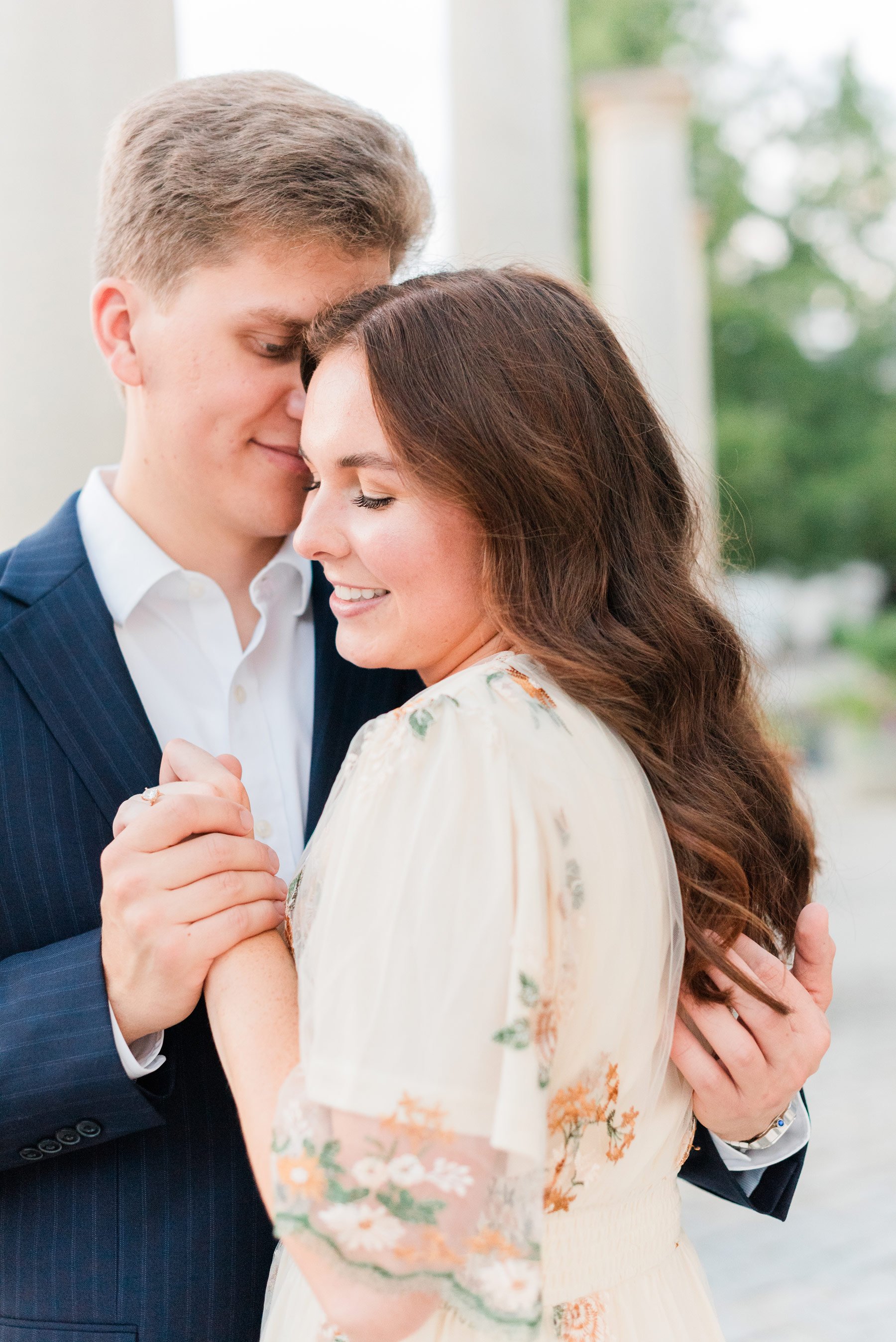    I love this flowing boho dress with floral detailing against his classic pinstriped suit. #trilithstudios #georgiaweddingphotographer #fayettevillephotographer #fayettevilleengagementphotos #outdoorengagements #formalengagementphotos #reasonstoboo