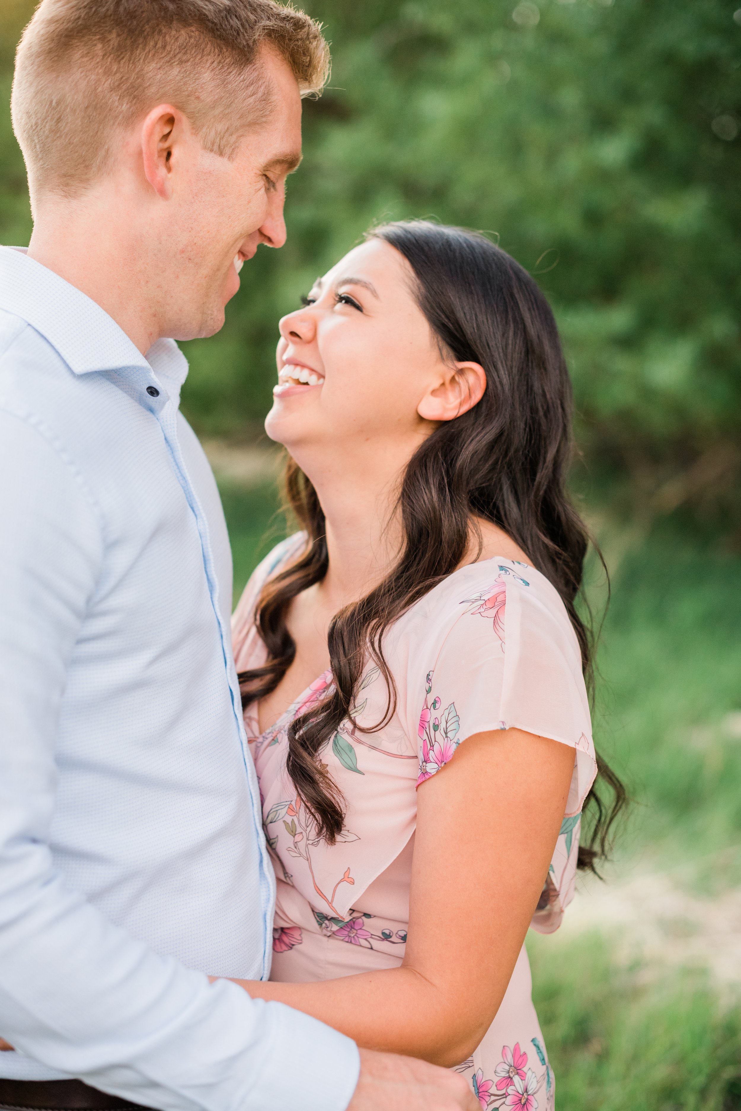  A wife smiles at her husband in a photo captured by Georgia-based photographer, Jacquie Erickson. email templates know your clients photo timeline updates #postphotoshoottips #GeorgiaFamilyPhotographer #photographertips #peachtreeGAphotographer&nbsp