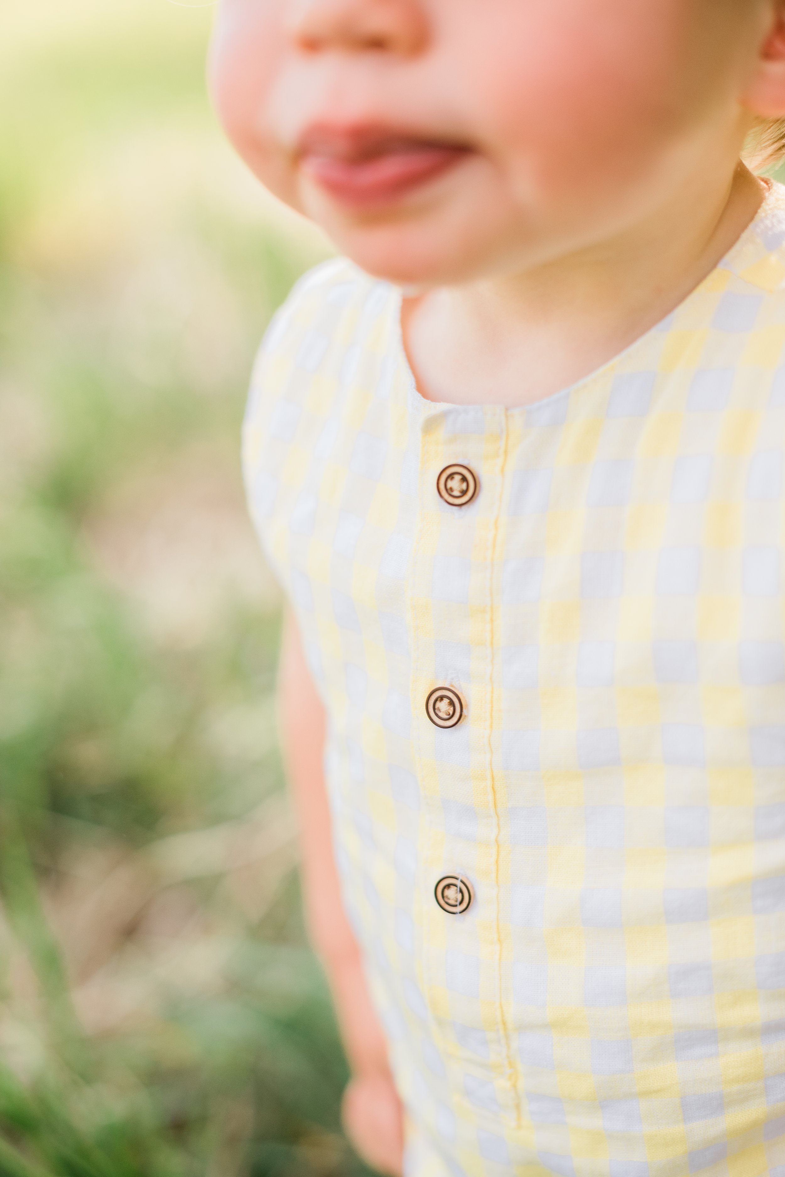  This close-up photo captures the details of a toddler with their puckered lips and rosy cheeks. Closeup toddler photo rosy cheers toddler girl #closeupshot #chubbytoddler #toddlerface #jacquieerickson #youngkids #georgiaphotographer 
