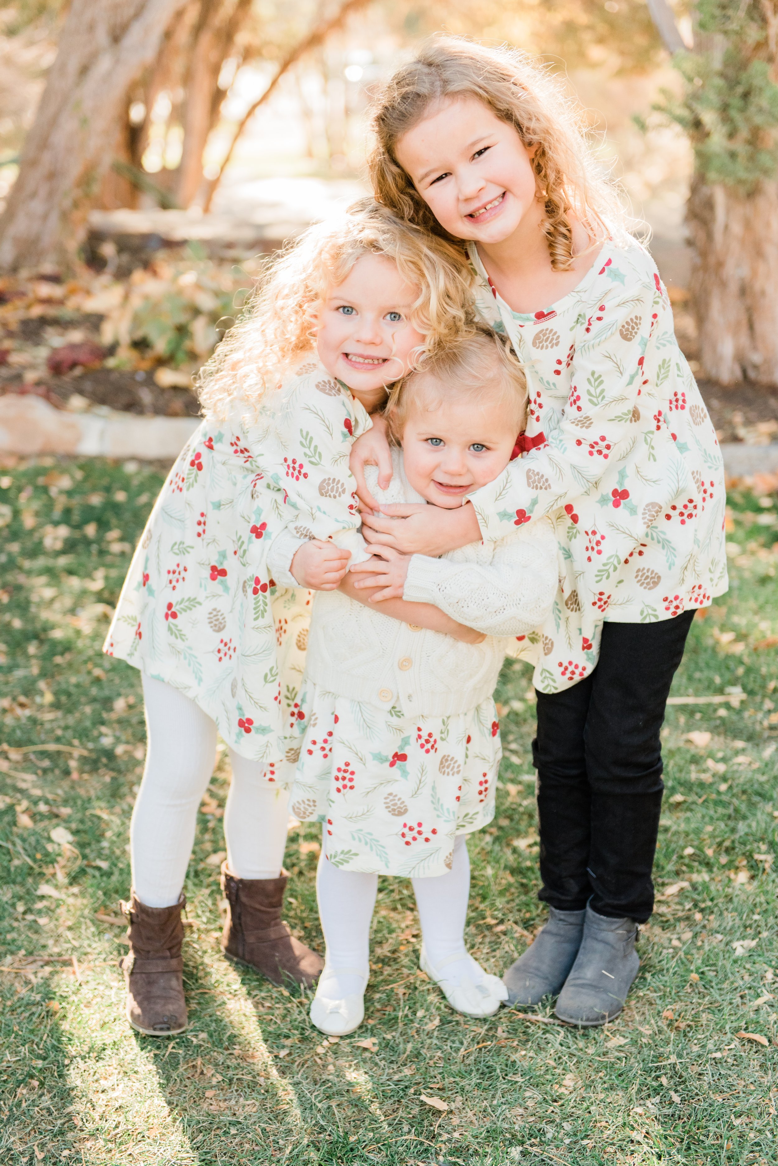  Three sweet sisters in matching outfits smile brightly together for a cherished sister photo. Sister photos momtog course Roswell GA Jacquie Erickson #diyphotography #firstdayofschoolphotos #capturethemoment #siblingphotos #jacquieerickson 