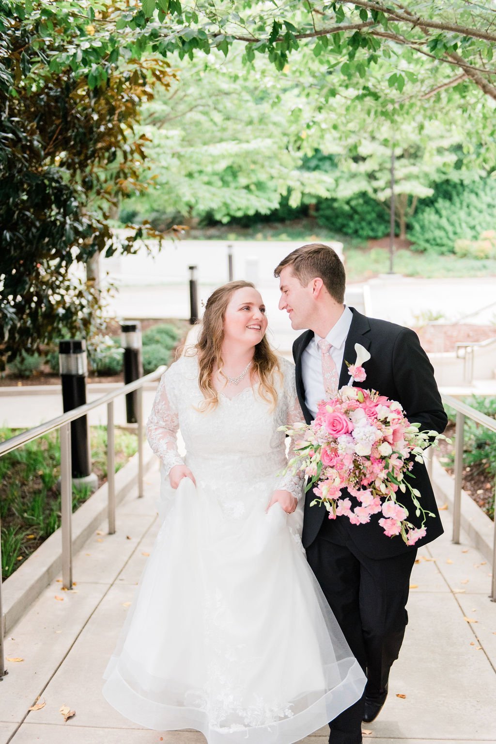  The look between this newlywed is one of pure love and joy and is captured by Georgia-based photographer Jacquie Erickson newlyweds walking photo temple grounds&nbsp; #jacquieericksonphotography #ldstemplewedding #atlantageorgiaweddings #jacquieeric