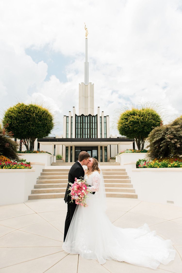  Capturing the beauty of the temple and the love between this newlywed couple creates a beautiful picture this couple with cherish forever. Kissing in front of the temple Atlanta Georgia temple #ldstemplewedding #atlantageorgiaweddings #jacquieericks